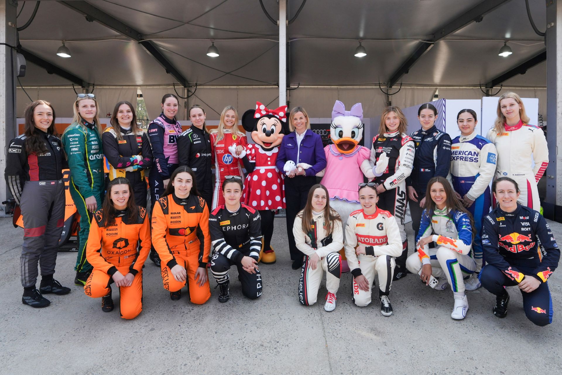 Minnie Mouse and Daisy Duck with F1 Academy