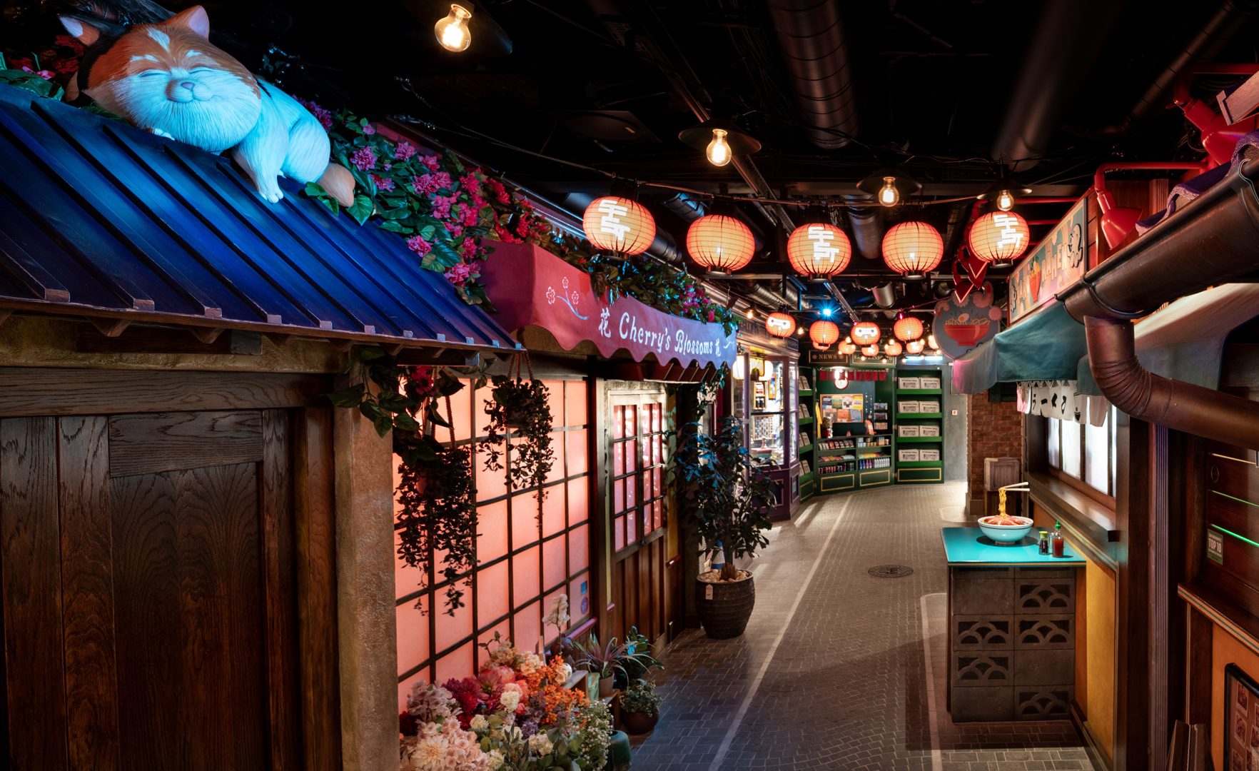 San Fransokyo Street on the Disney Adventure is a family entertainment area pulses with the energy and atmosphere of a vibrant street market and boasts an assortment of interactive games and activities, shops, cinemas and more