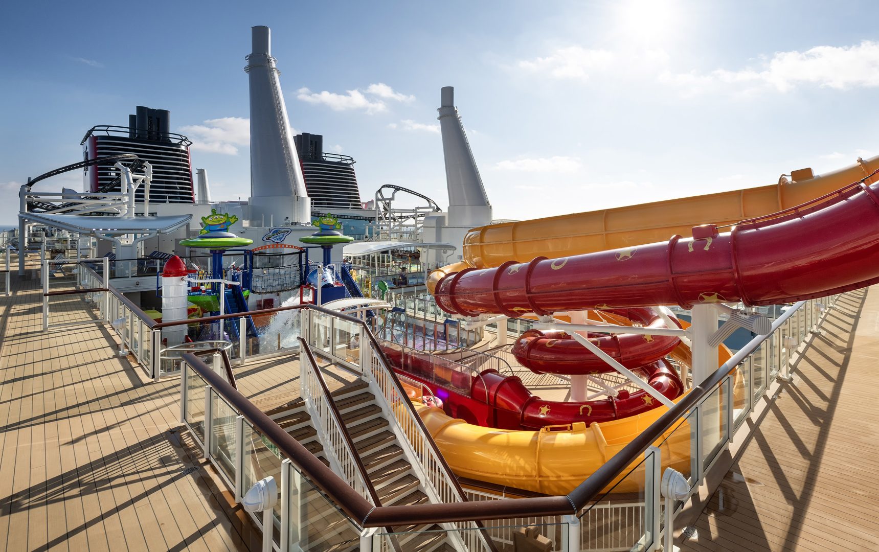 Woody and Jessie&rsquo;s Wild Slides on the Disney Adventure feature the iconic bright red and yellow colors, sending guests twisting and turning down to a splash-tacular landing