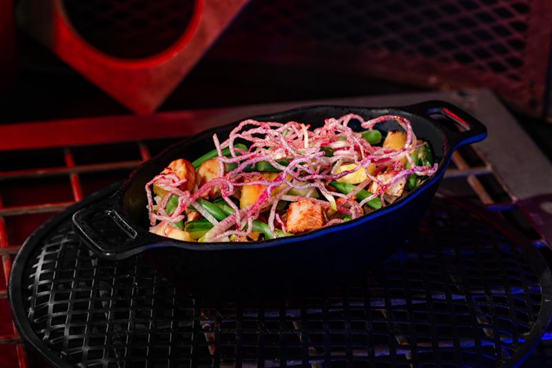 Endorian Chicken Tip-Yip Salad: Guava BBQ chicken with avocado-jalapeño dressing, arugula, radish, romaine lettuce, cucumber, red onion, haricot vert, pineapple, and rice noodles