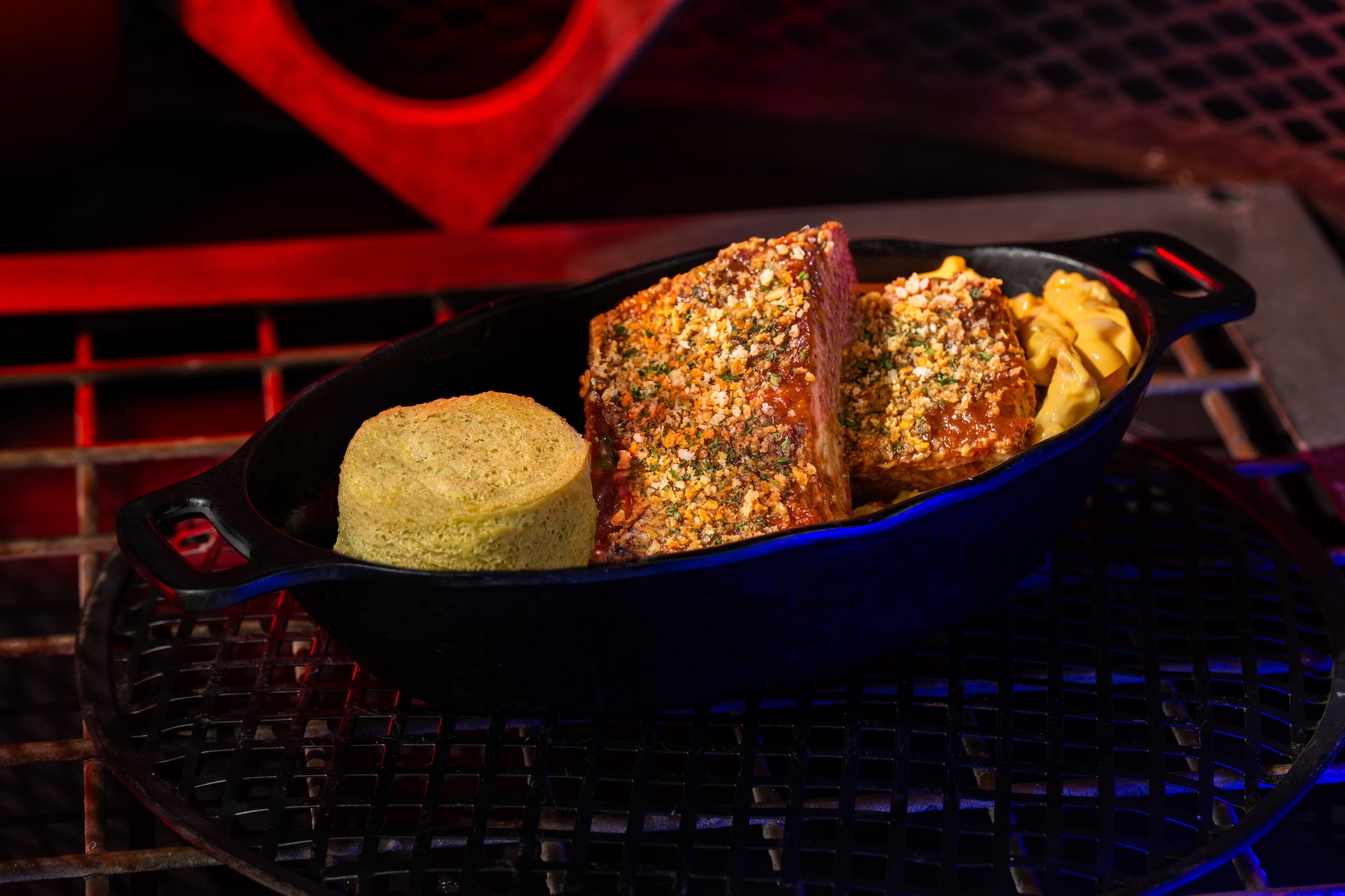 Sweet Puffer Pig Ribs with Portion Bread: Pork ribs brushed with tangy BBQ sauce and served with mac & cheese and sponge cake​