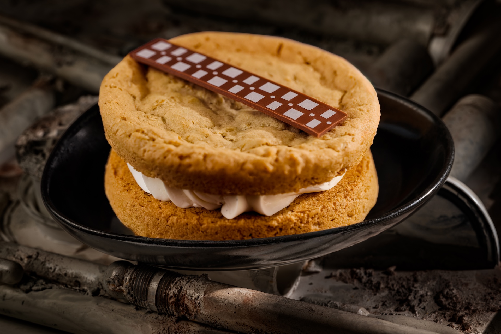 Wookiee Cookie: Two oatmeal cookies filled with vanilla cream and topped with a milk chocolate ribbon