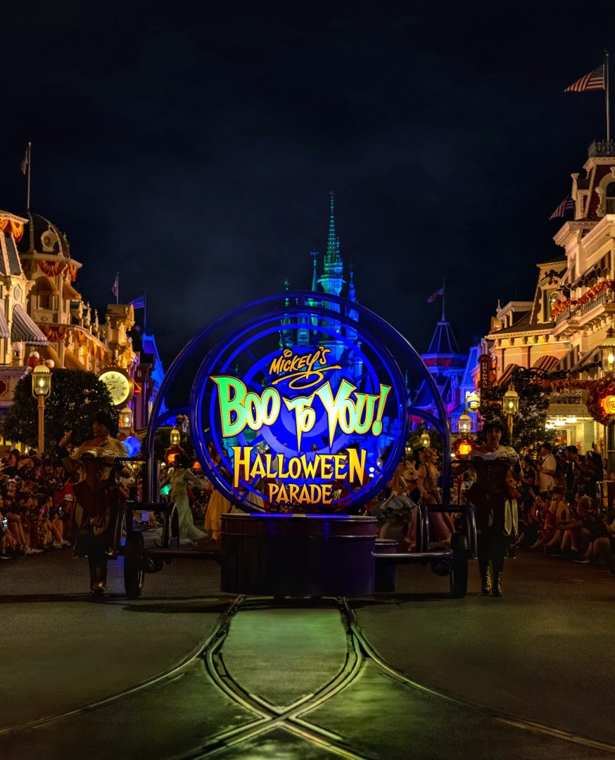 Mickey's Boo to You Halloween Parade floats through a festive night scene.
