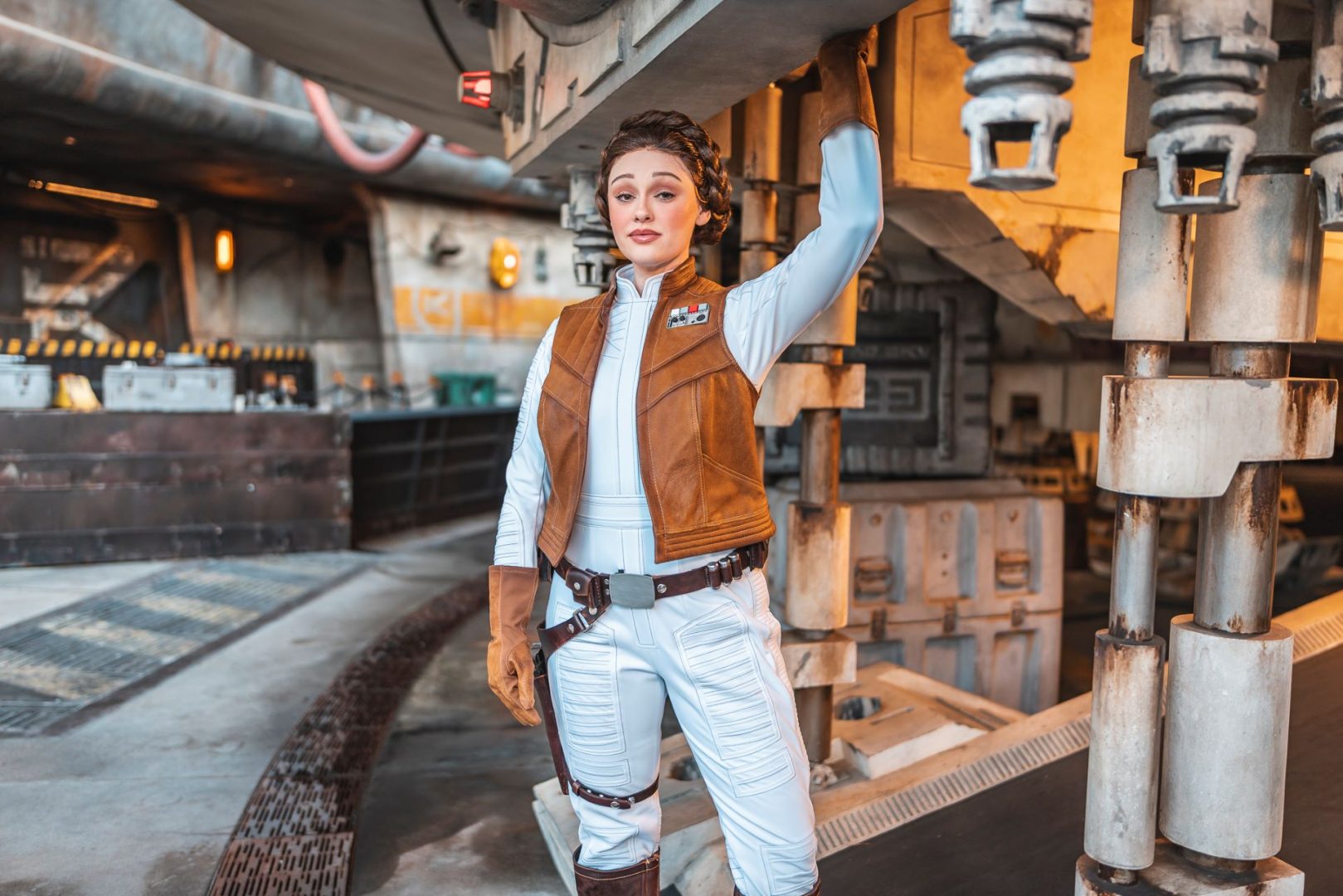 Character dressed as Leia Organa poses in a Star Wars-themed setting.