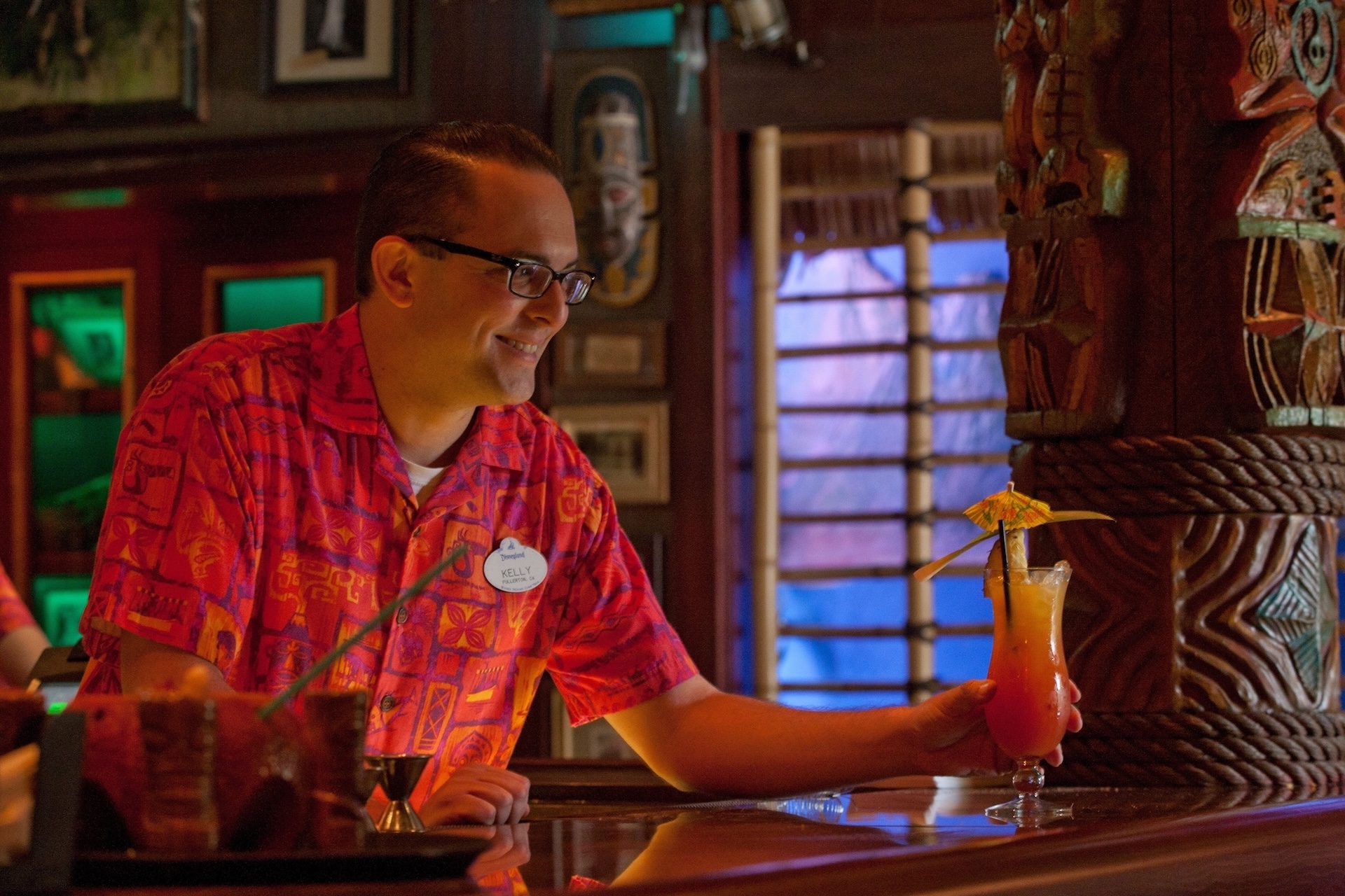 Trader Sam's Enchanted Tiki Bar Disneyland Hotel Cast Member with Drink