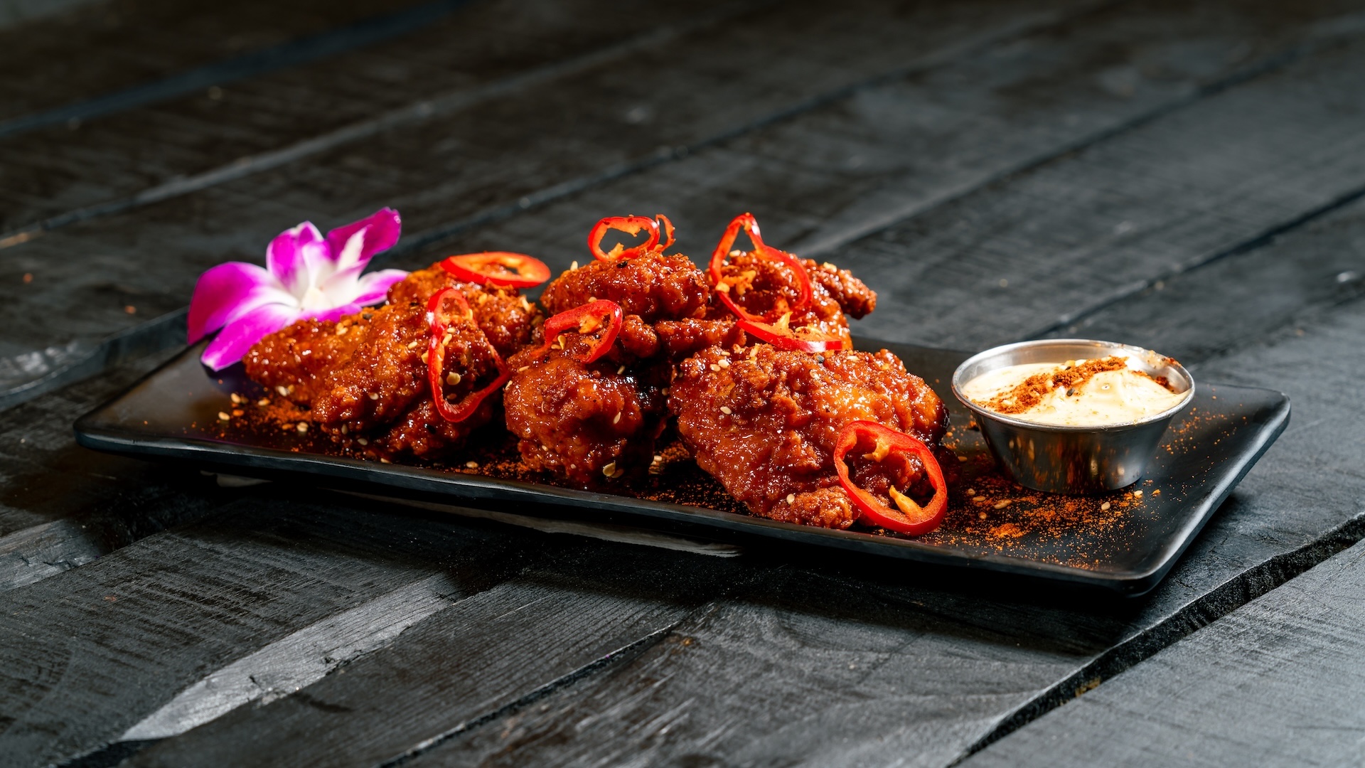 Trader Sam's Enchanted Tiki Bar Disneyland Hotel Chile-Orange Glazed Chicken Wings with togarashi a&iuml;oli