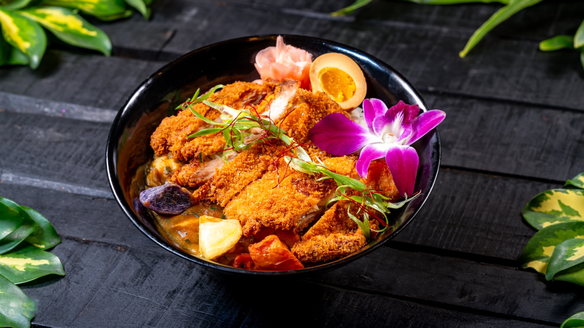 Trader Sam's Enchanted Tiki Bar Disneyland Hotel Chicken Katsu Curry: Crispy chicken cutlet, Japanese curry, jasmine rice, soy-marinated egg, and pickled ginger