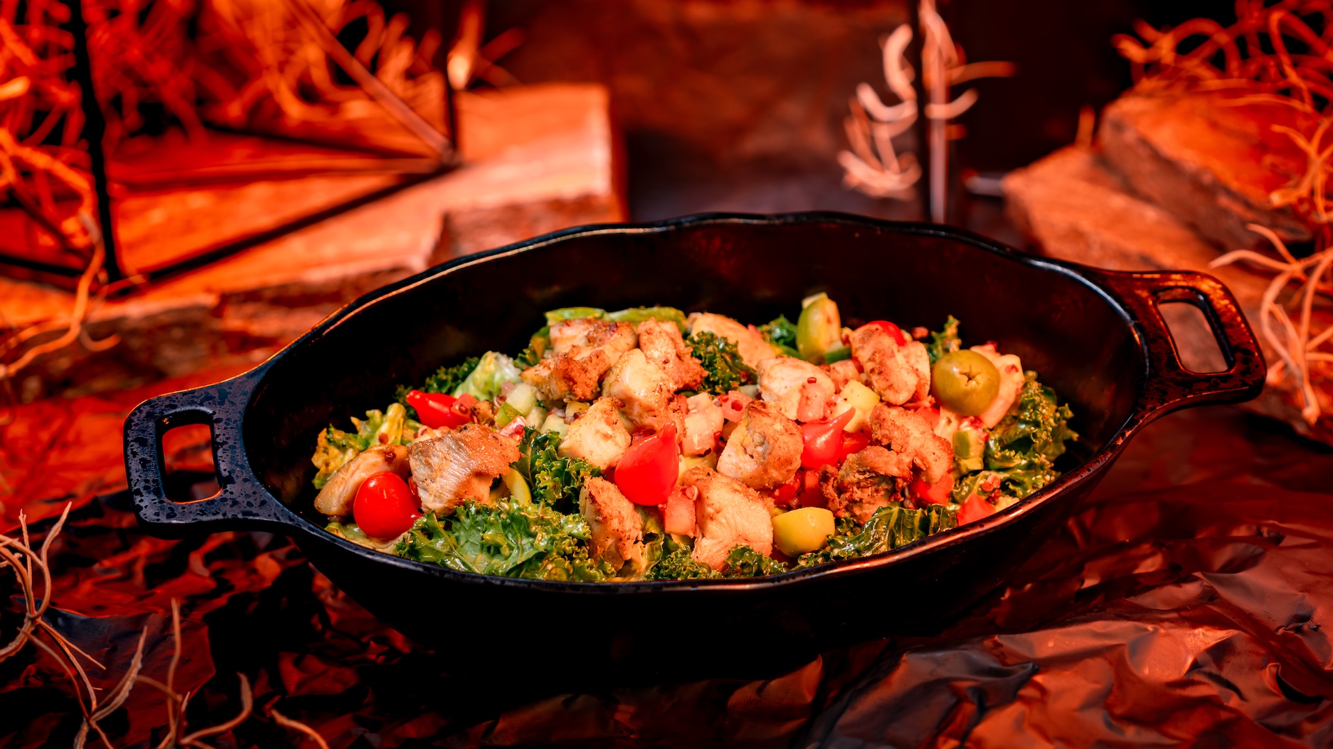 The Surabat Valley Greens Chicken Salad with marinated roasted chicken breast, quinoa-veggie mix, mini peppers, olives, and cilantro dressing