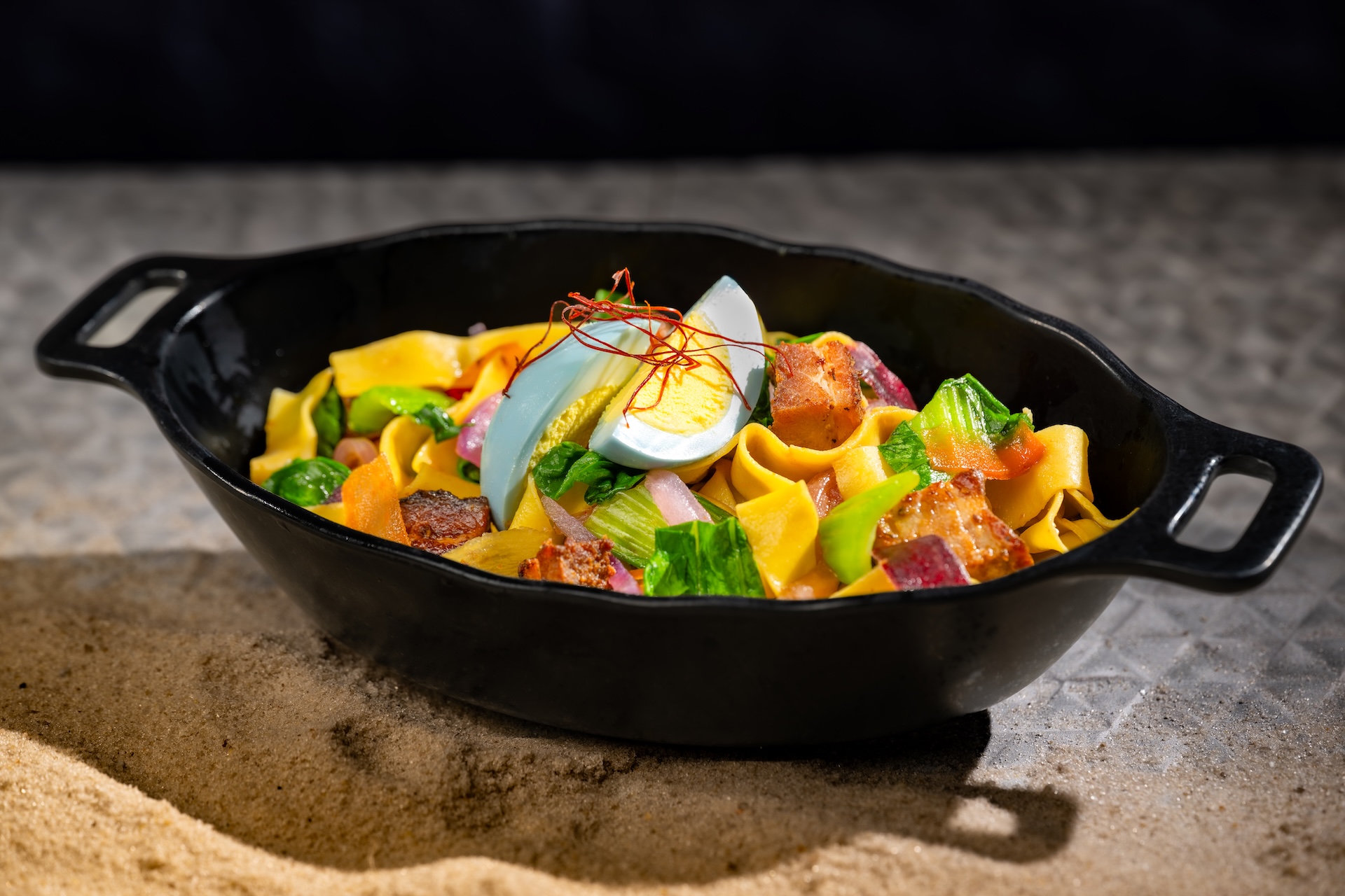 Sweet-and-Spicy Puffer Pig Pasta: Flat noodles with pork belly, bok choy, sweet-and-spicy soy sauce, and hard boiled egg (New)