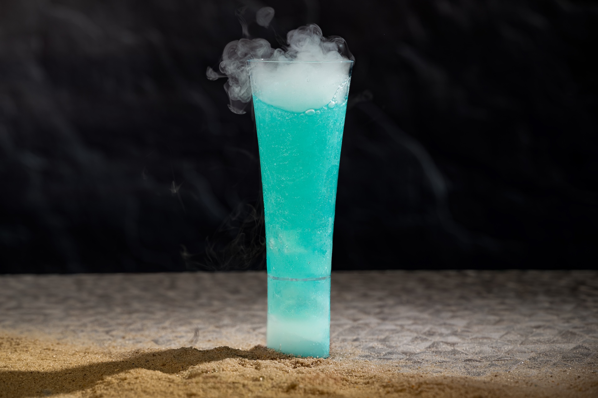 Spotchka: Hendrick's Gin, honey syrup, Lillet Blanc Aperitif, lemon juice, and Bols Blue Cura&ccedil;ao​ Liqueur served in a jet chill glass