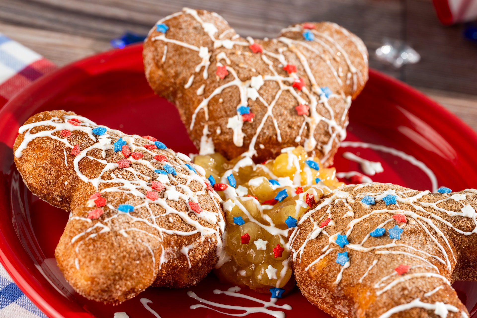 Disney Parks America 250 Foodie Guide Fourth of July Beignets: Cinnamon sugar-dusted beignets with marshmallow sauce (New)
