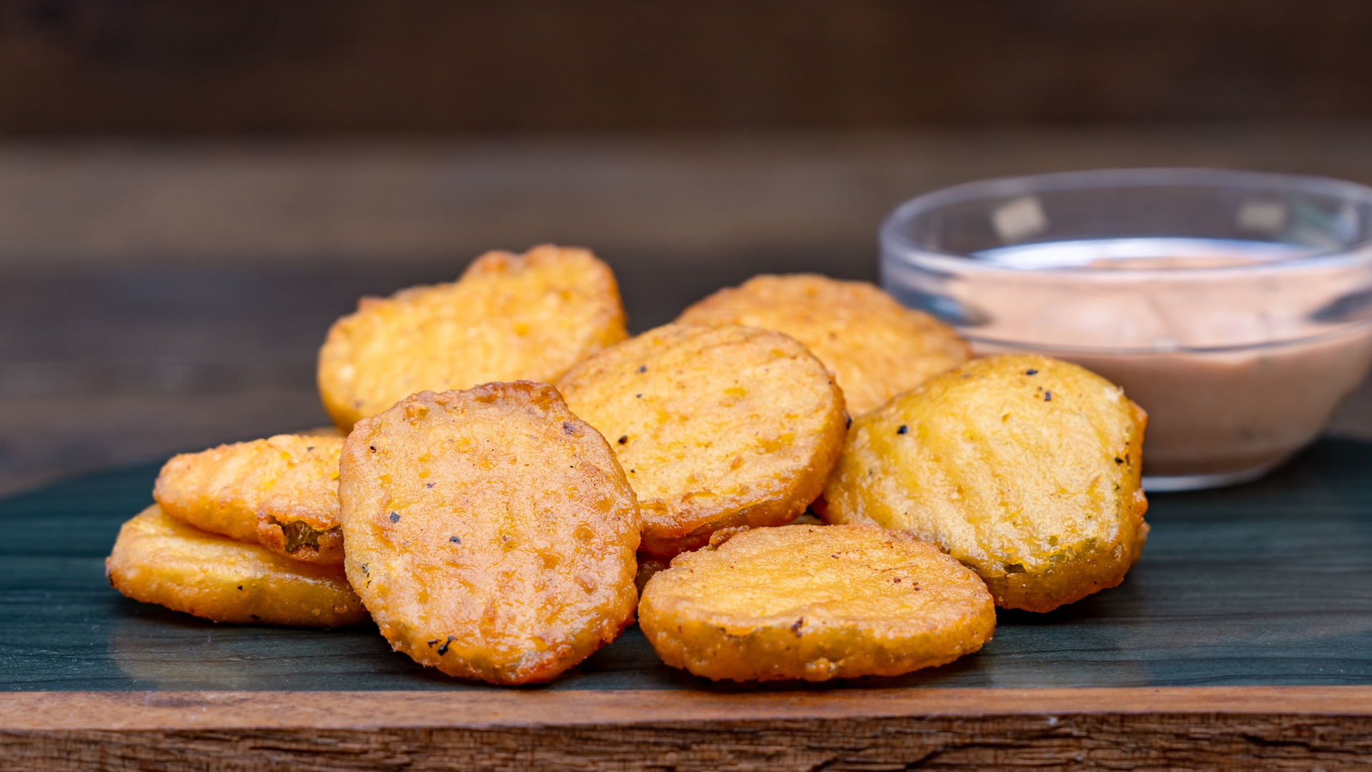 Disney Parks America 250 Foodie Guide Fried Pickles with Buffalo ranch