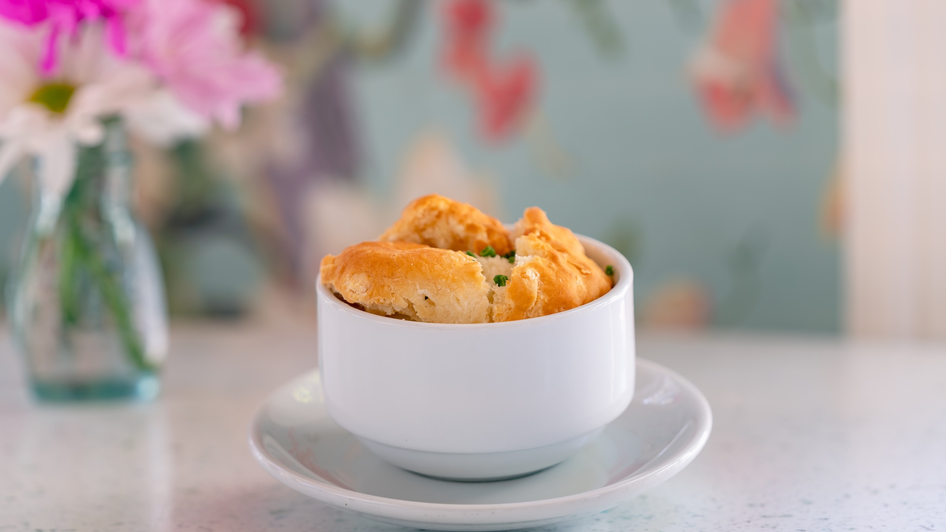 Disney Parks America 250 Foodie Guide Chicken Pot Pie Soup: Chicken, biscuit, and chives