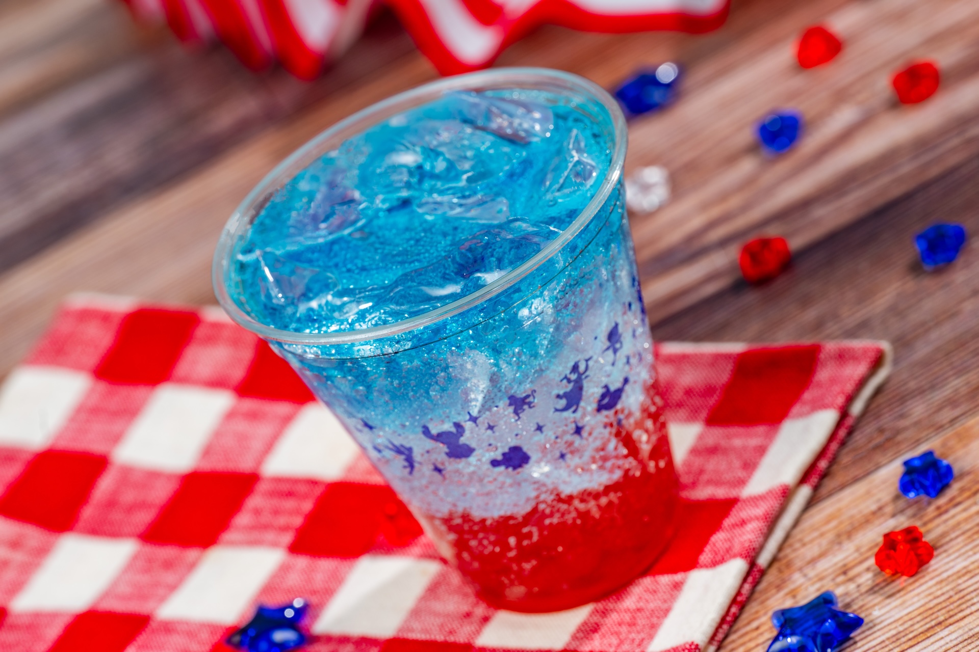 Disney Parks America 250 Foodie Guide The 1776: Blue raspberry, Sprite, and strawberry fruit juice-filled pearls (Non-alcoholic) (New)