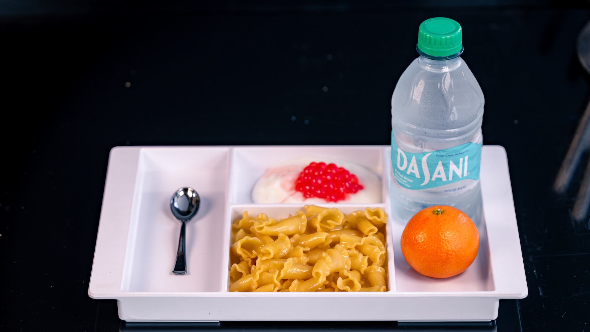 Disneyland Kids Meals Kid's Buttered Noodles: Campanelli pasta tossed in melted butter served with a Cuties Mandarin Orange and choice of small DASANI Water or small lowfat milk