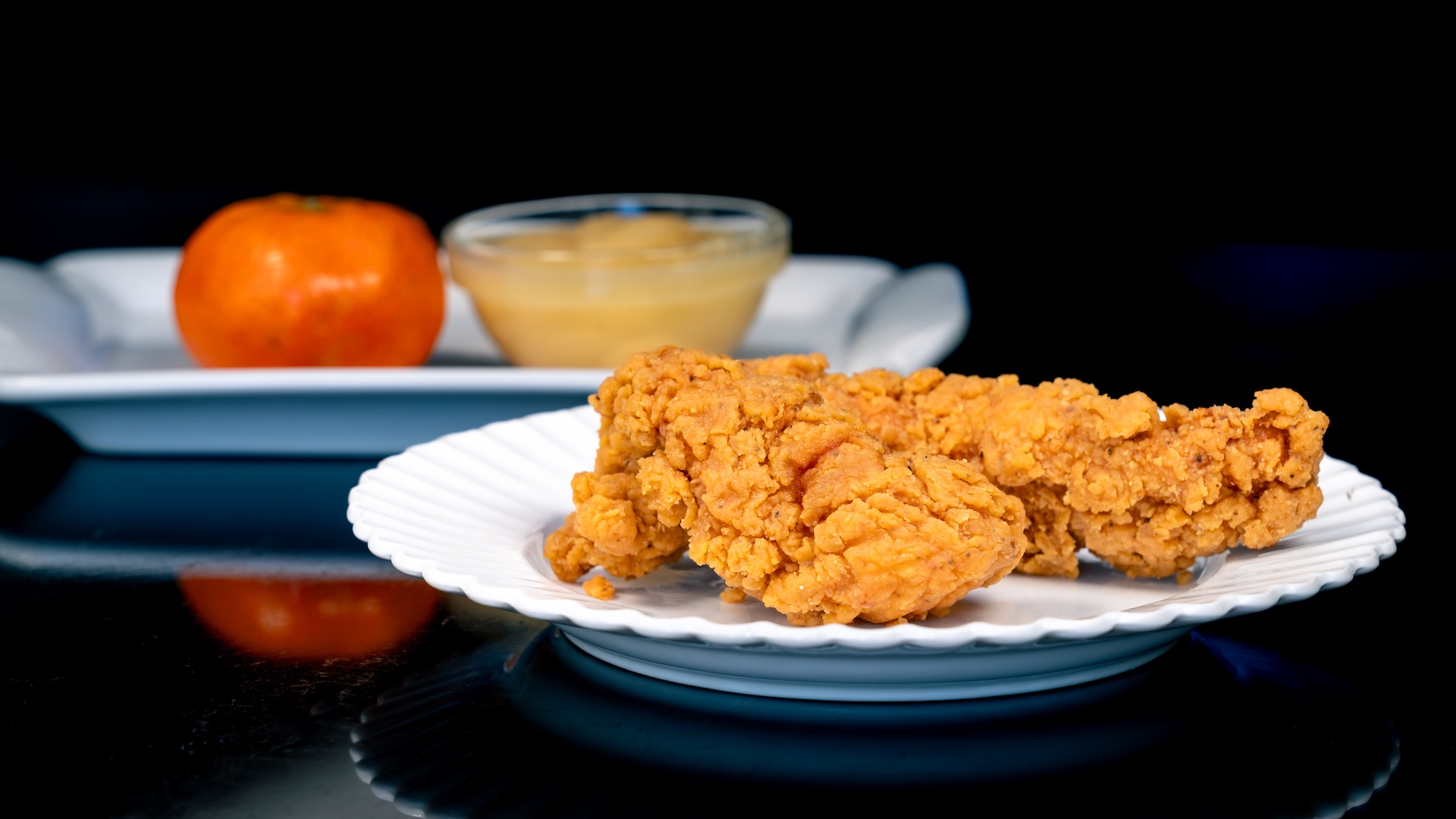 Disneyland Kids Meals Chicken Tenders: Chicken tenders served with a Cuties Mandarin Orange, applesauce, and choice of small DASANI Water or small lowfat milk