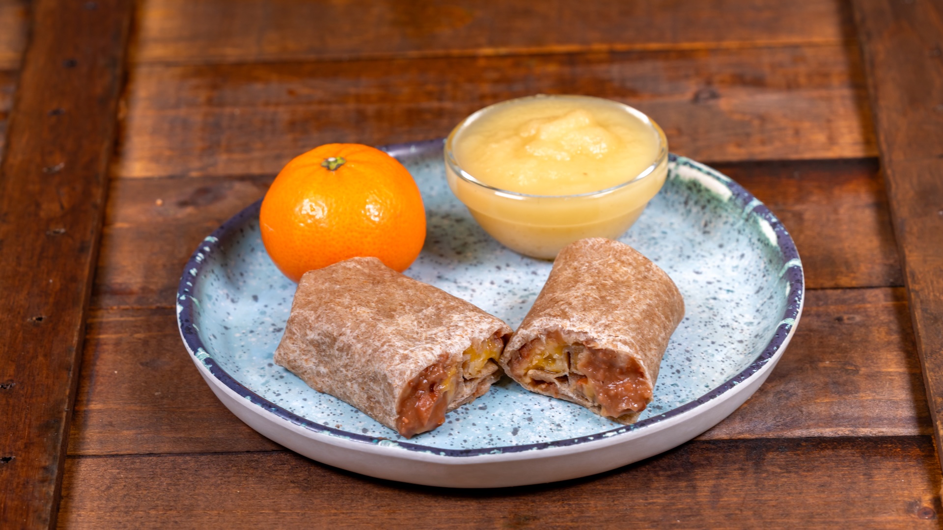 Disneyland Kids Meals Bean and Cheese Burrito with a Cuties Mandarin Orange, applesauce, and choice of small DASANI Water or small lowfat milk