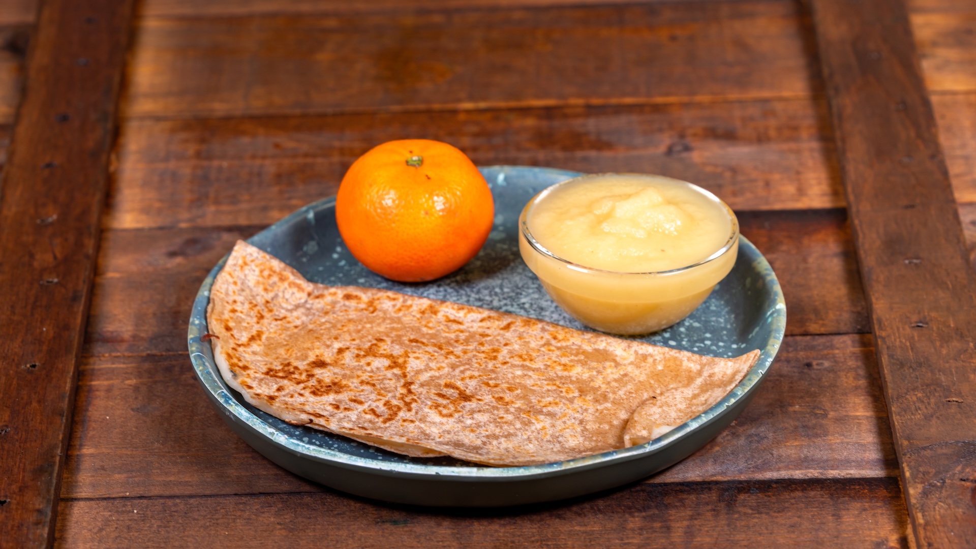 Disneyland Kids Meals Cheese Quesadilla: Whole wheat tortilla filled with jack and cheddar served with a Cuties Mandarin Orange, applesauce, and choice of small DASANI Water or small lowfat milk