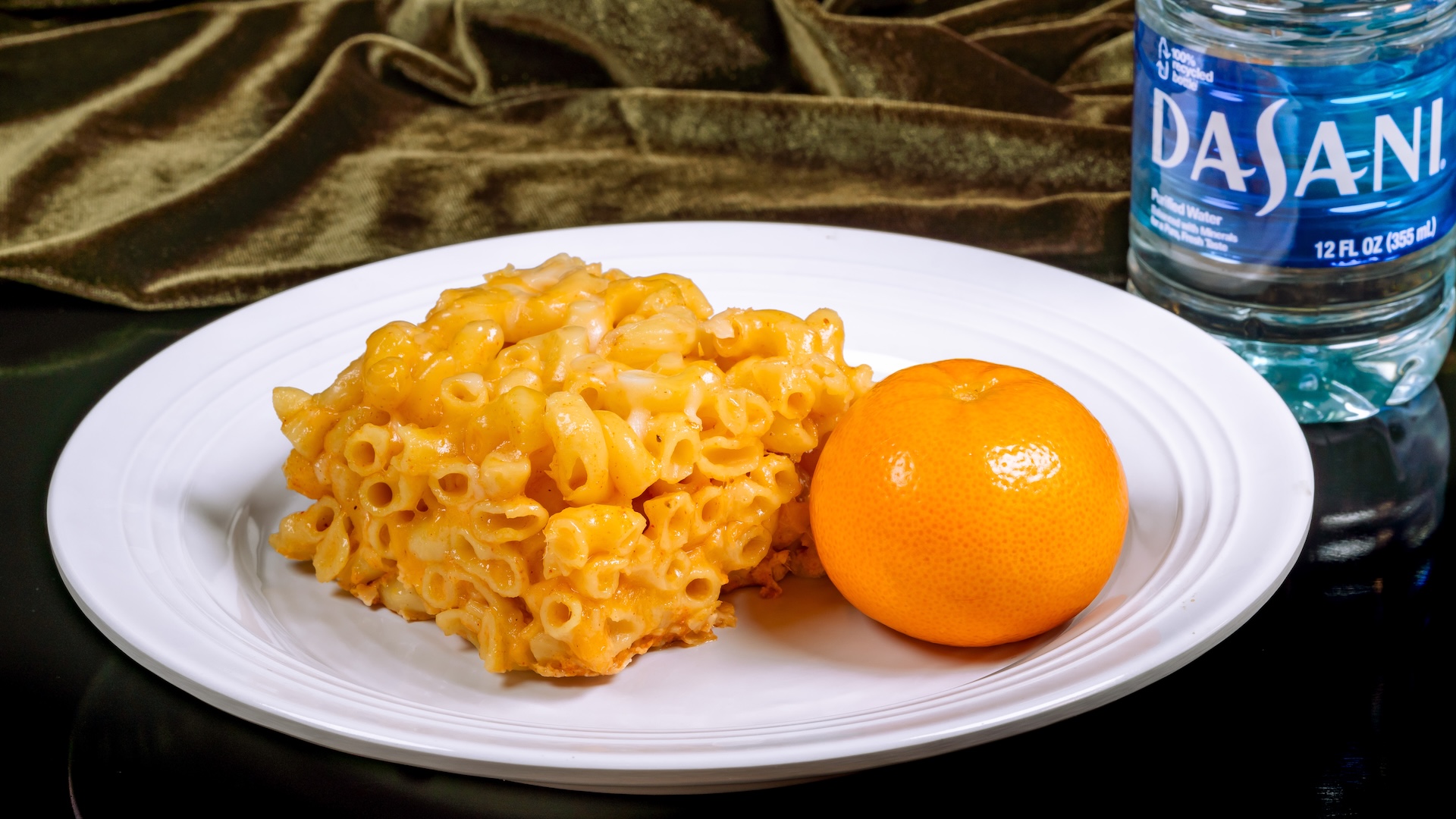 Disneyland Kids Meals Baked Macaroni and Cheese served with a Cuties Mandarin Orange and applesauce with choice of small DASANI Water or small lowfat milk (egg allergy-friendly and peanut allergy-friendly options also available)