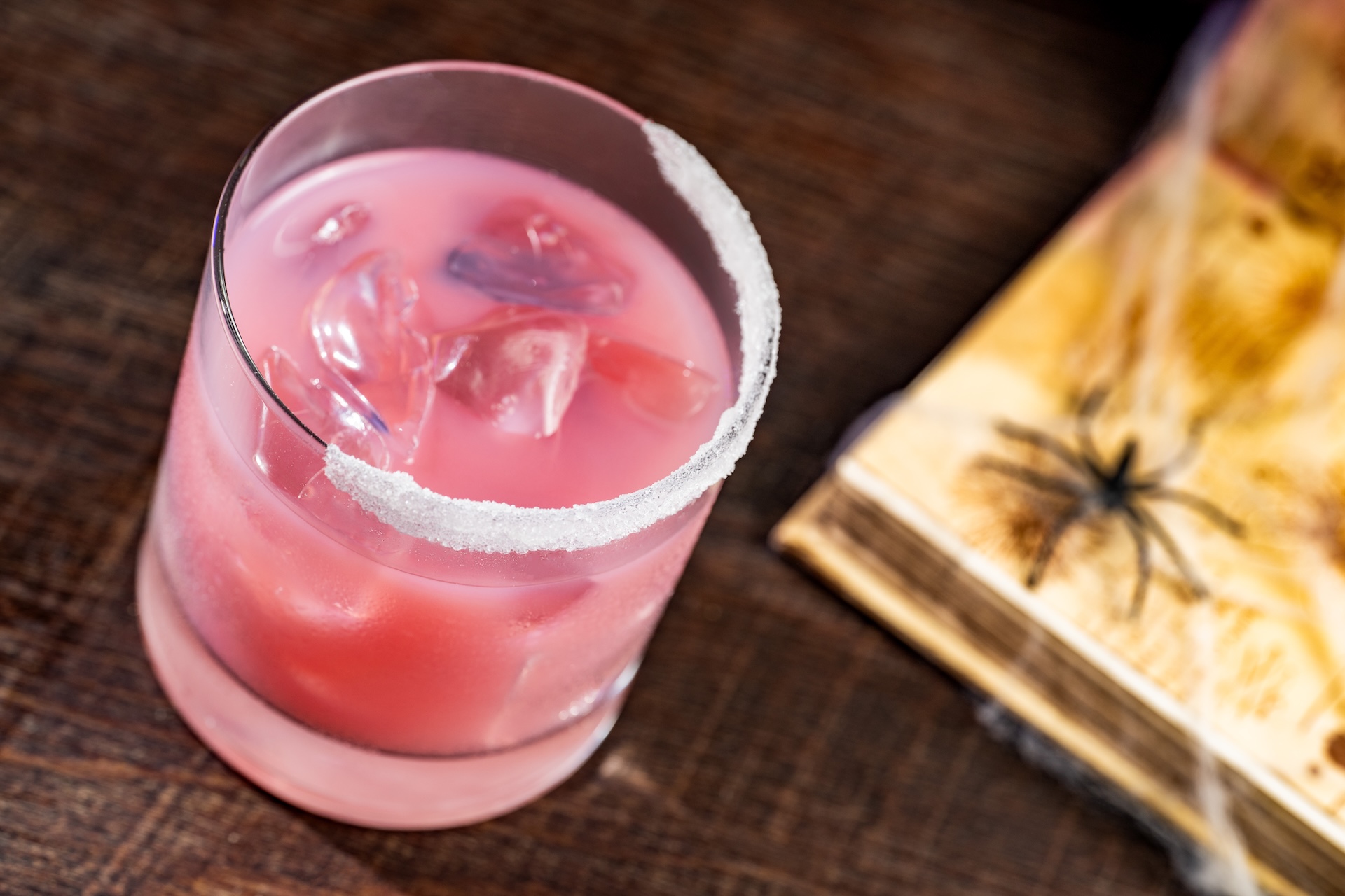 Castle Fog: Empress 1908 Gin, Bols Blackberry Liqueur, lemon juice, and cane syrup