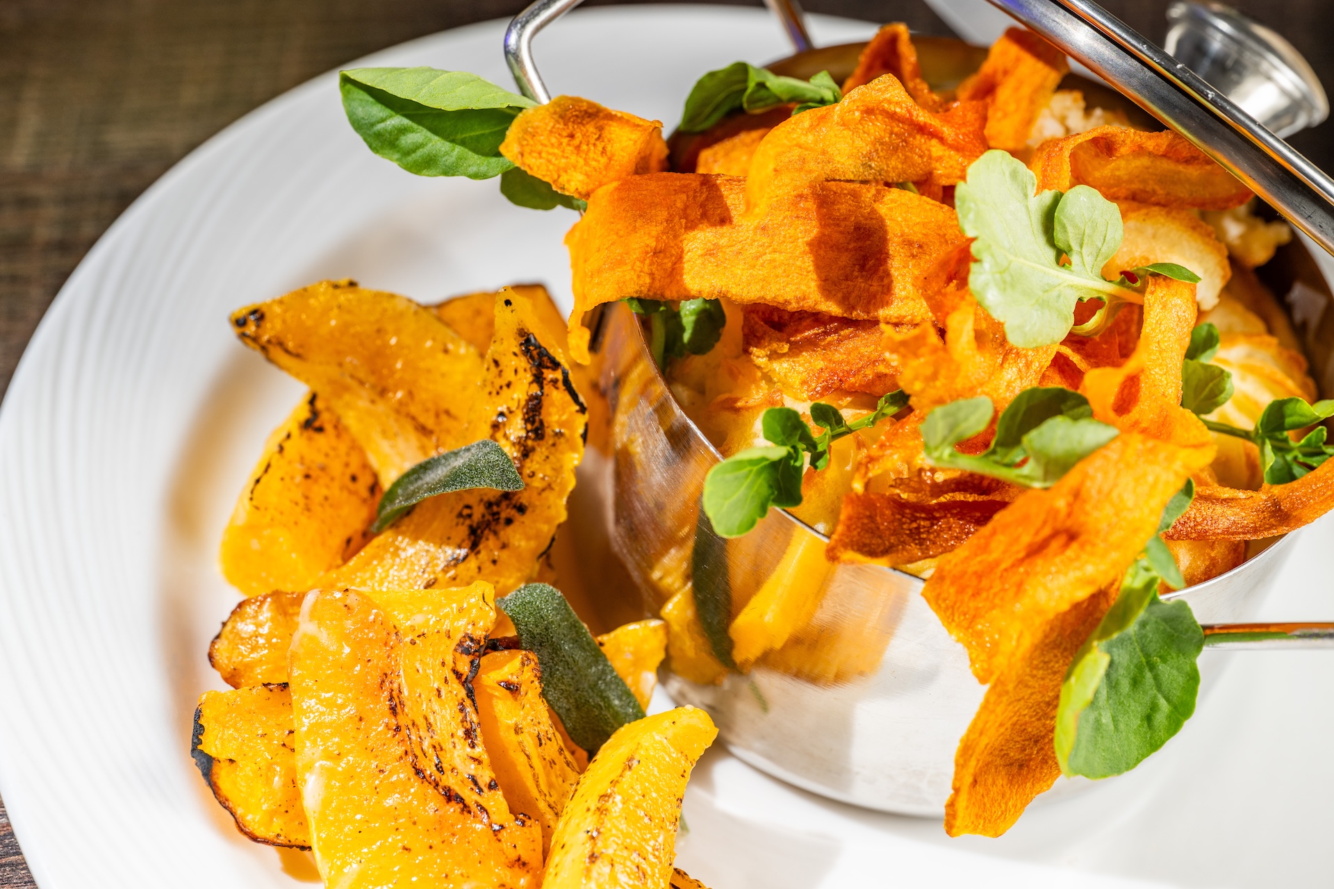 Chicken Cauldron: Black truffle sauce, root vegetables, and potato-pumpkin pur&eacute;e (New)