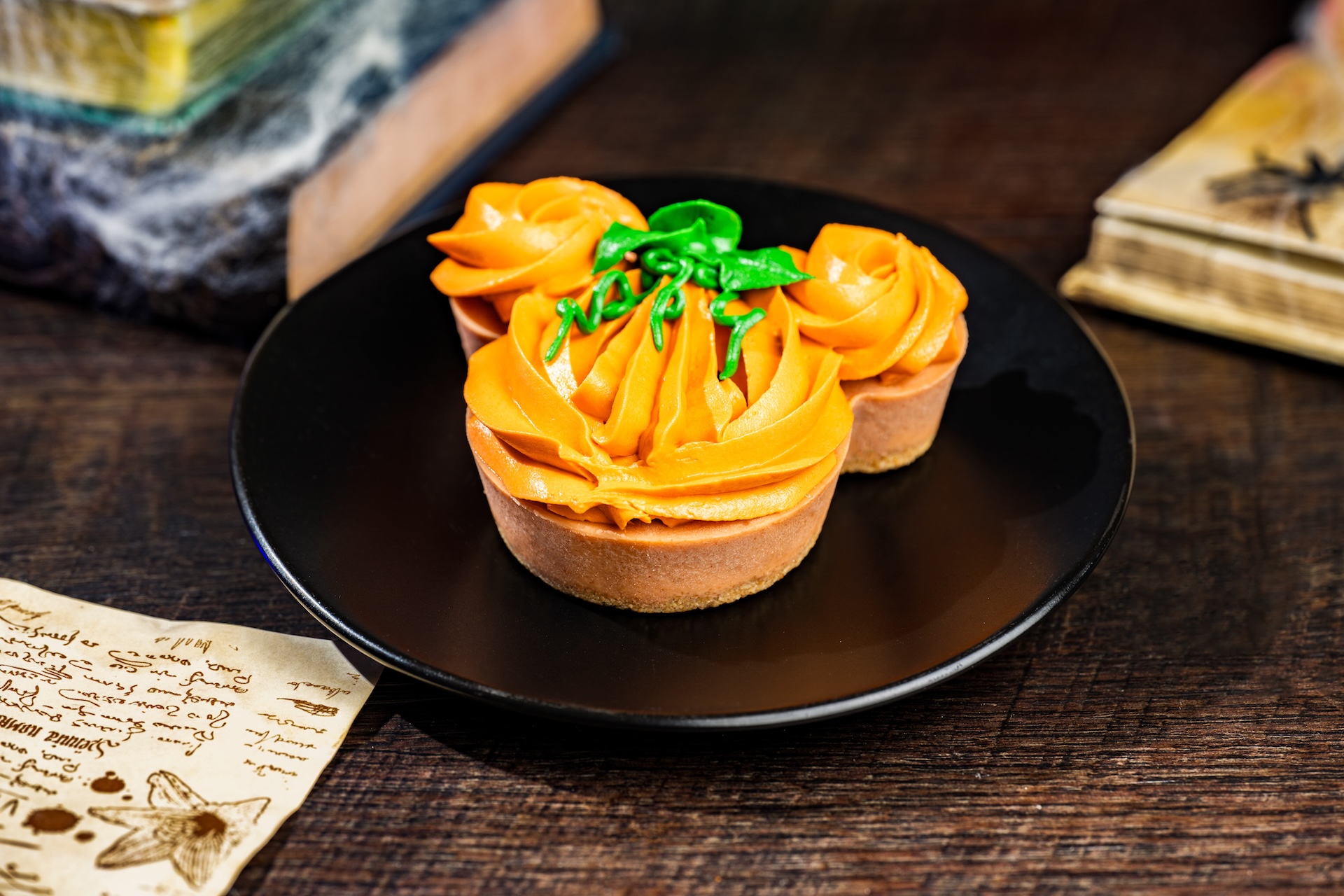 Mickey-shaped Cheesecake: Pumpkin cheesecake with graham cracker crust and white chocolate whipped ganache (Available during Mickey&rsquo;s Not-So-Scary Halloween Party only)