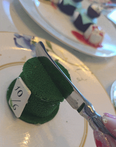 Mad Hatter Cake Garden View Tea GIF