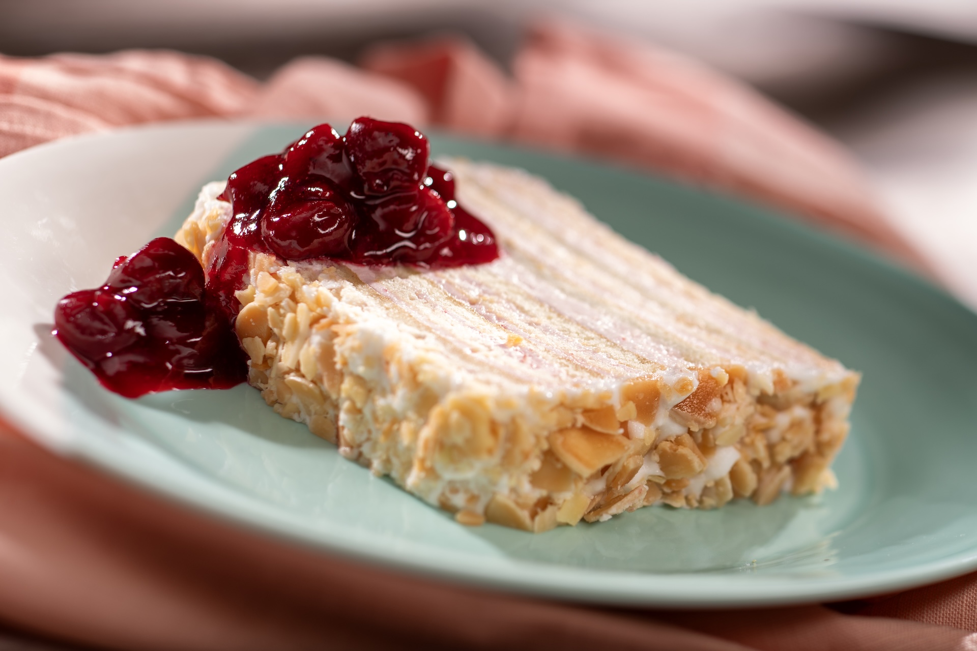 Kirschwasser Torte with cherry-brandy buttercream, fondant, sugared almonds, and cherry compote  
