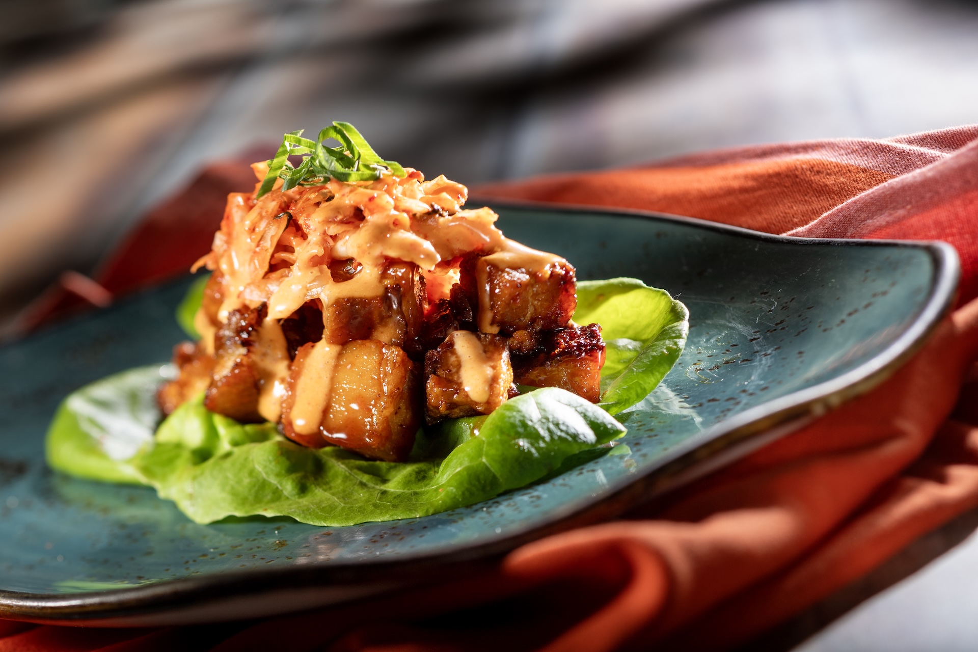 Bo Ssam Pork Belly Lettuce Wraps with bo ssam pork belly, kimchi slaw, and spicy a&iuml;oli (Introduced in 2010 at South Korea) (New) 