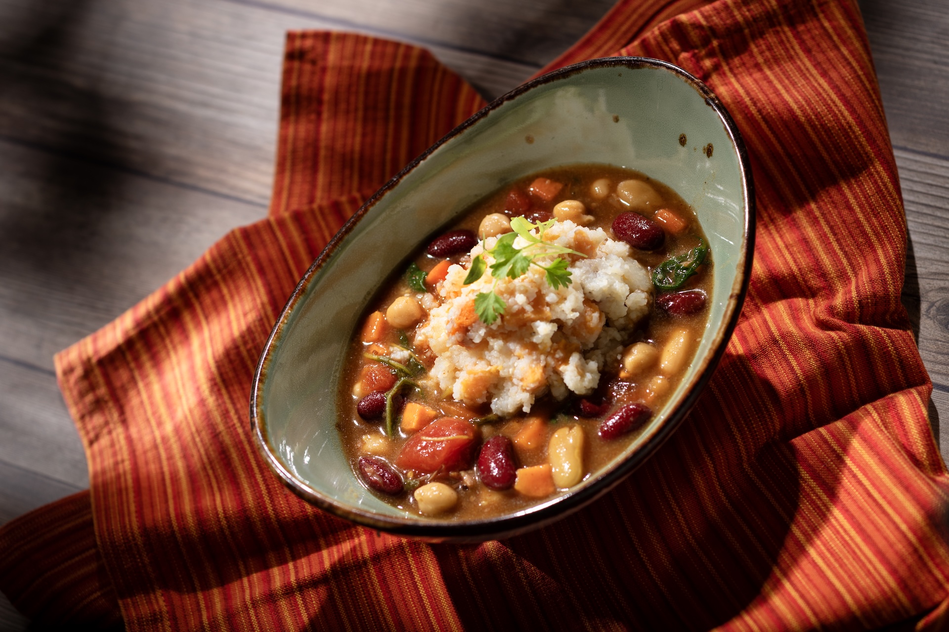 Sweet Potato Mealie Pap with a stew of beans, peppers, carrots, and tomatoes (Introduced in 2004 at South Africa) (Plant-based) (New)  