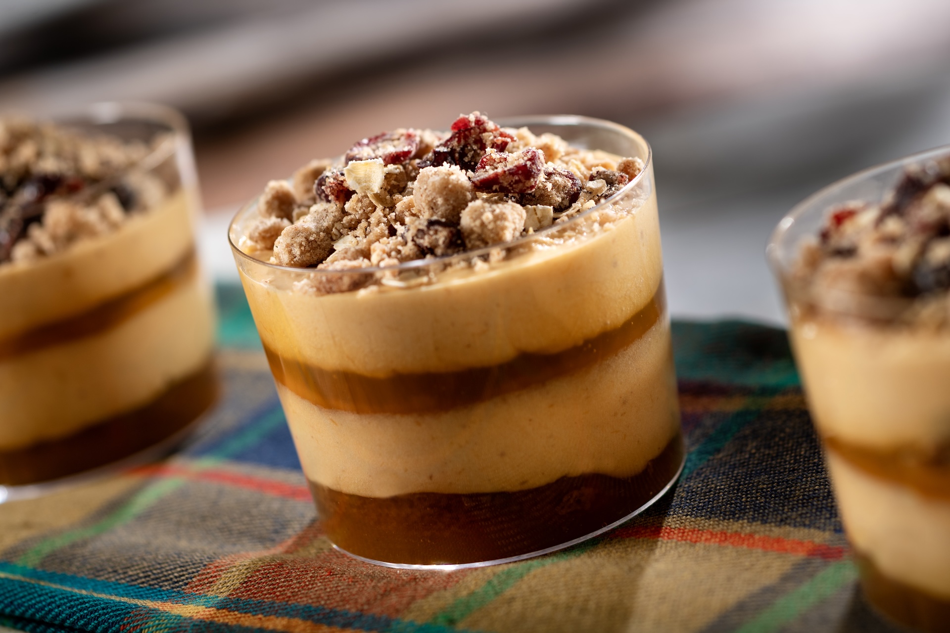 🧀 Pumpkin Cheesecake Mousse Trifle featuring PHILADELPHIA Cream Cheese with citrus sauce and spice cake topped with cranberry streusel (Introduced in 2011 at Hops & Barley) (New) 