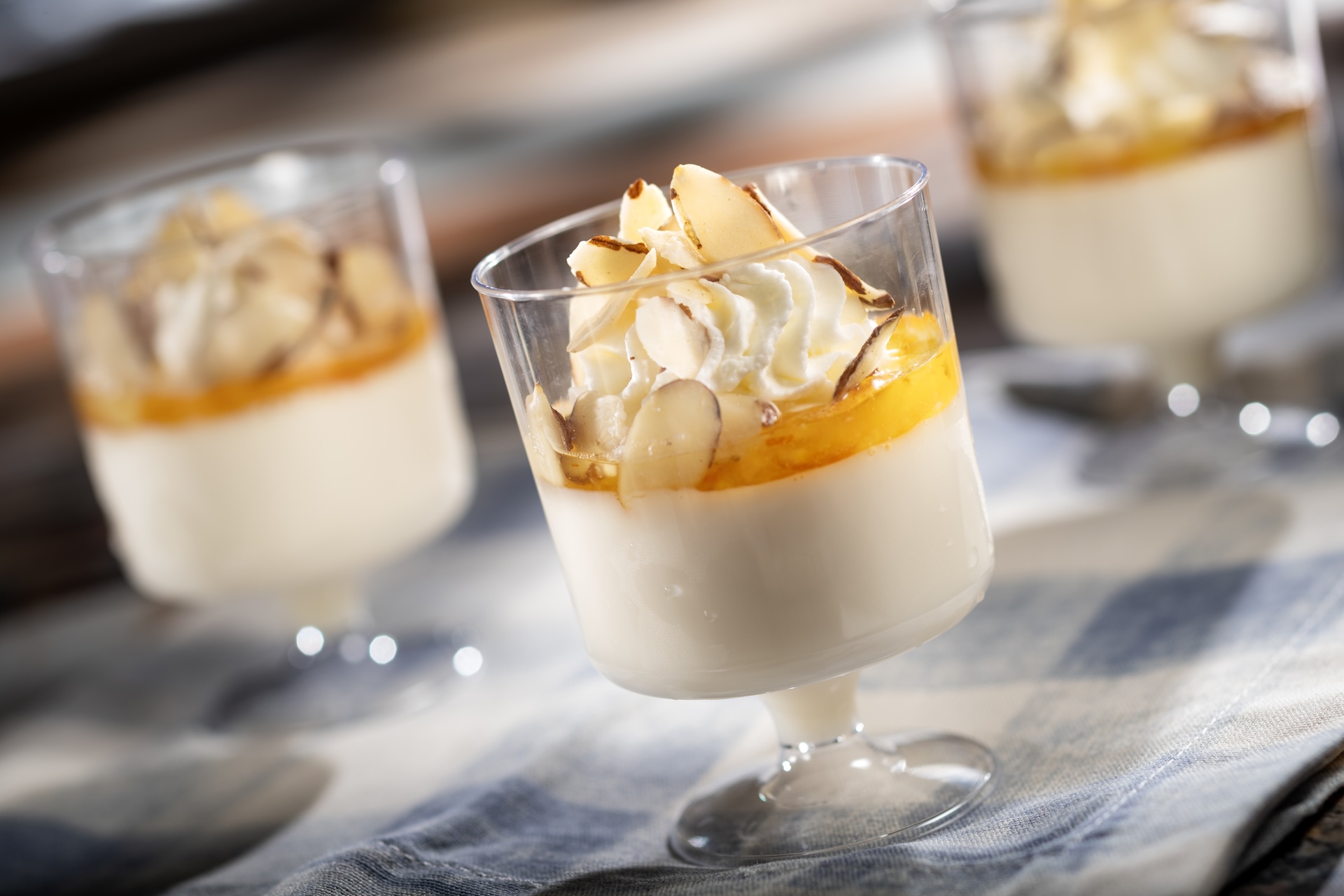 Almond Panna Cotta with orange marmalade, whipped cream, and candied almonds (New) 