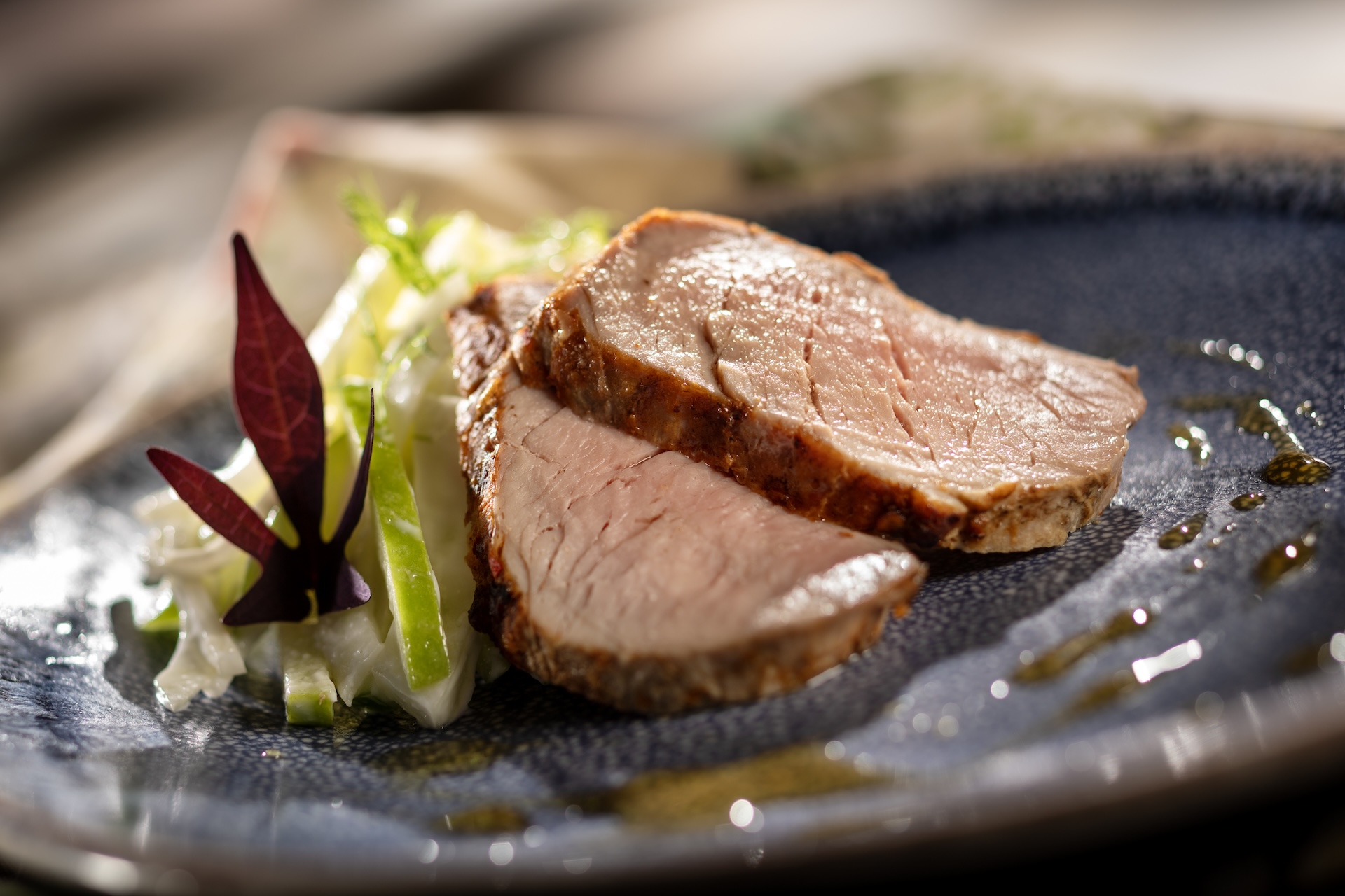 Grilled Cider-brined Pork Tenderloin with chili-apple butter, celeriac-apple slaw, and apple cider gastrique  