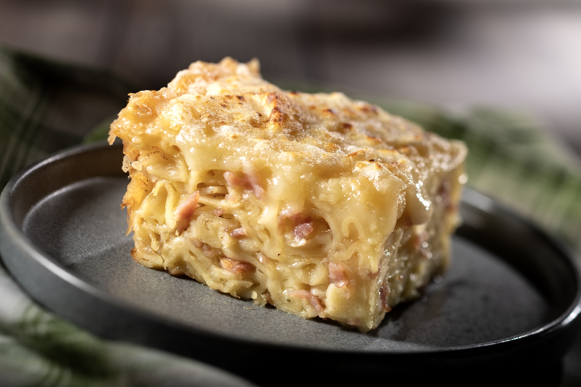 🧀 Schinkennudeln: Pasta gratin with ham, onions, and cheese (Introduced in 2010) 