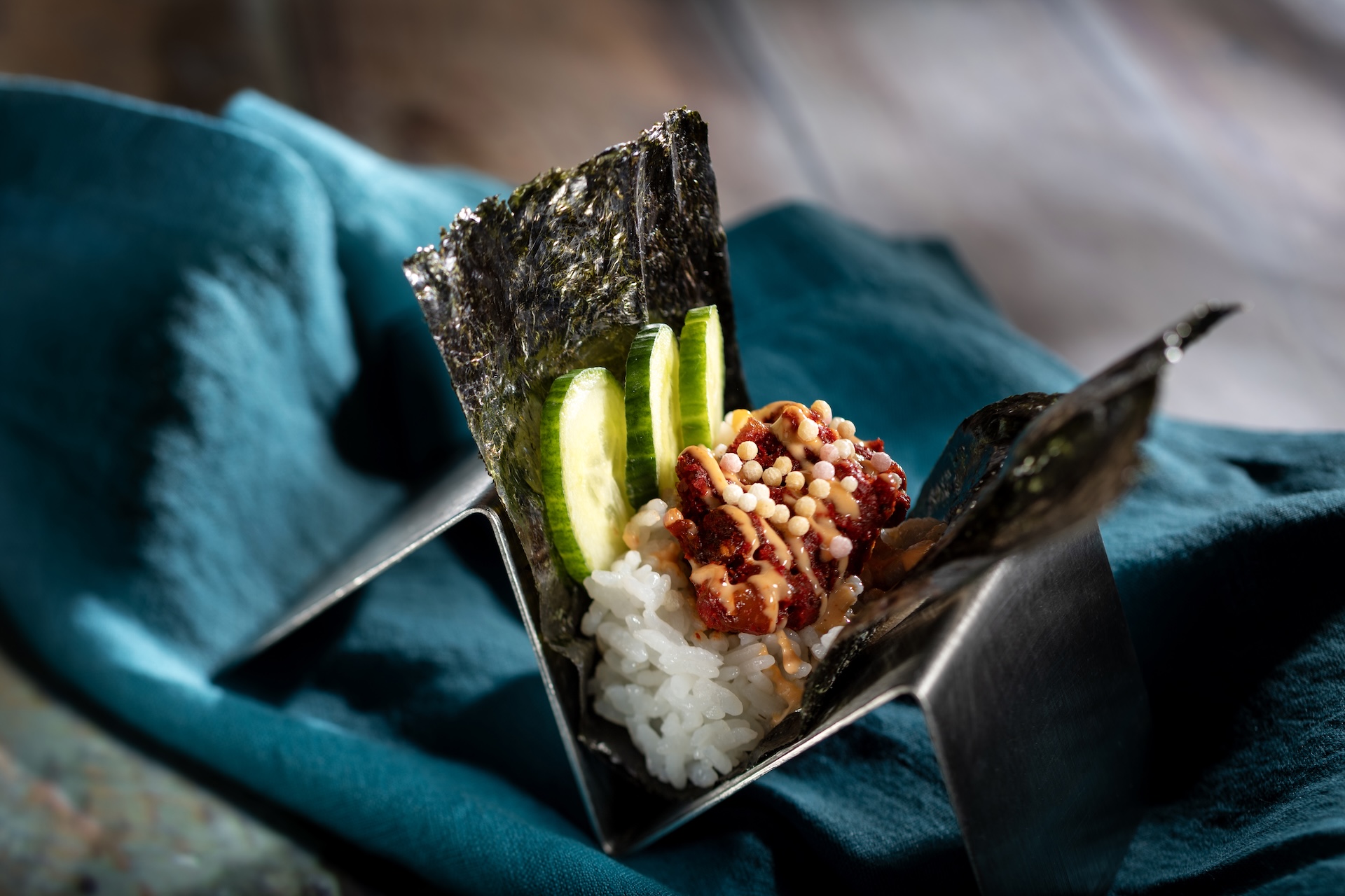 Spicy Temaki Hand Roll: Temaki hand roll with spicy tuna, cucumber, rice cracker, and spicy mayonnaise sauce (Introduced in 1996) (New) 