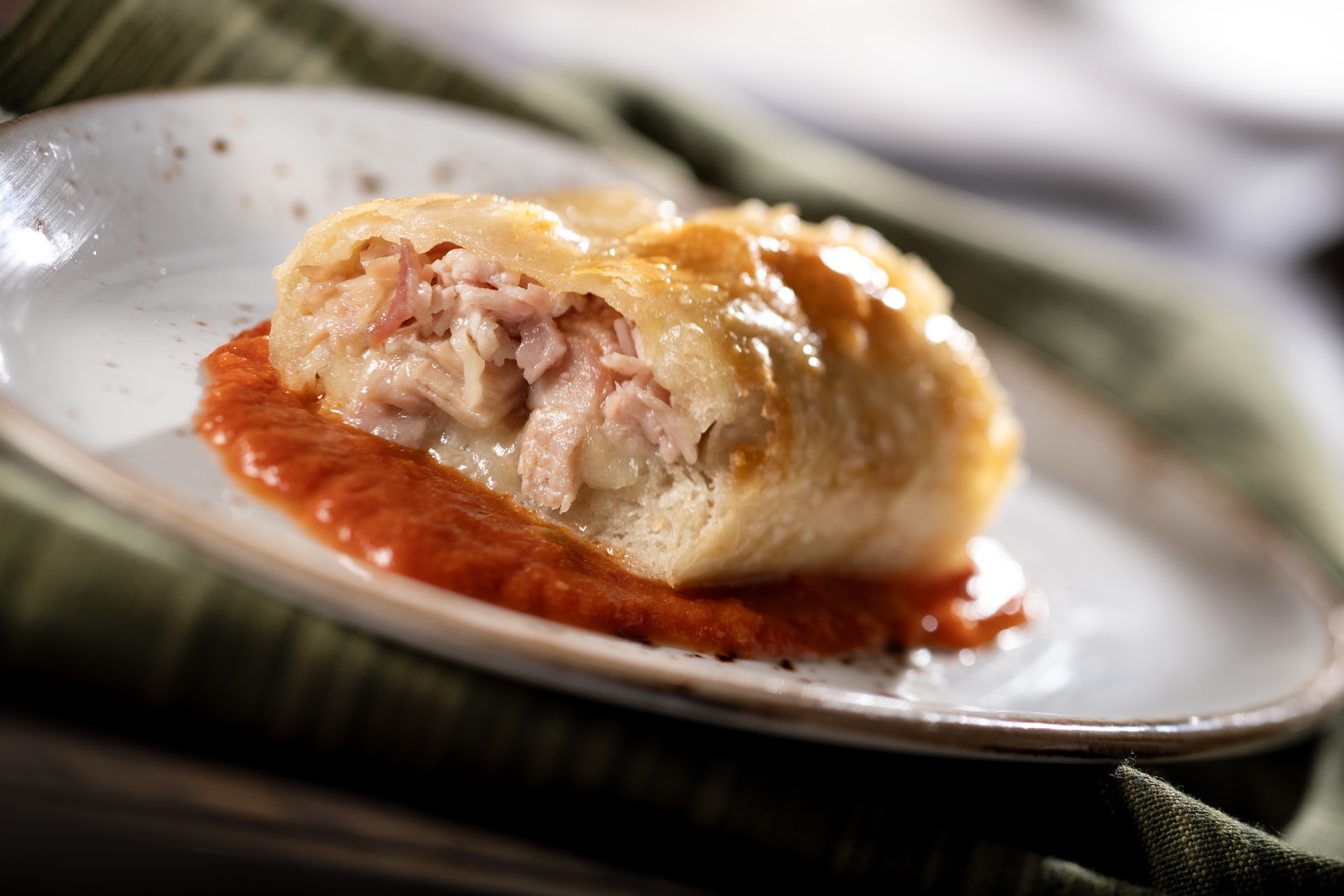Stromboli: Baked ham and provolone roll with Parmesan and tomato sauce (New) 