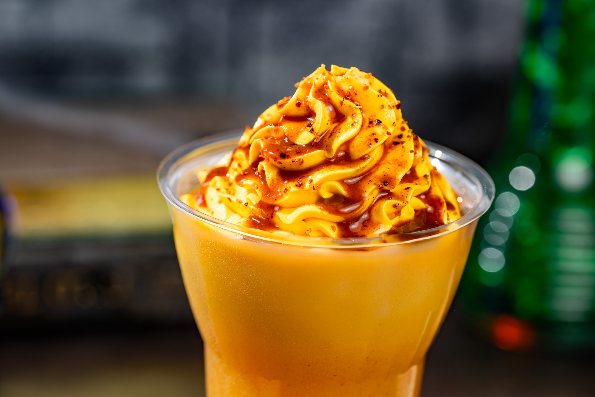 DOLE Whip Mango and Chamoy Float: DOLE Whip Mango, DOLE Pineapple Juice, chamoy, and chili-lime seasoning 