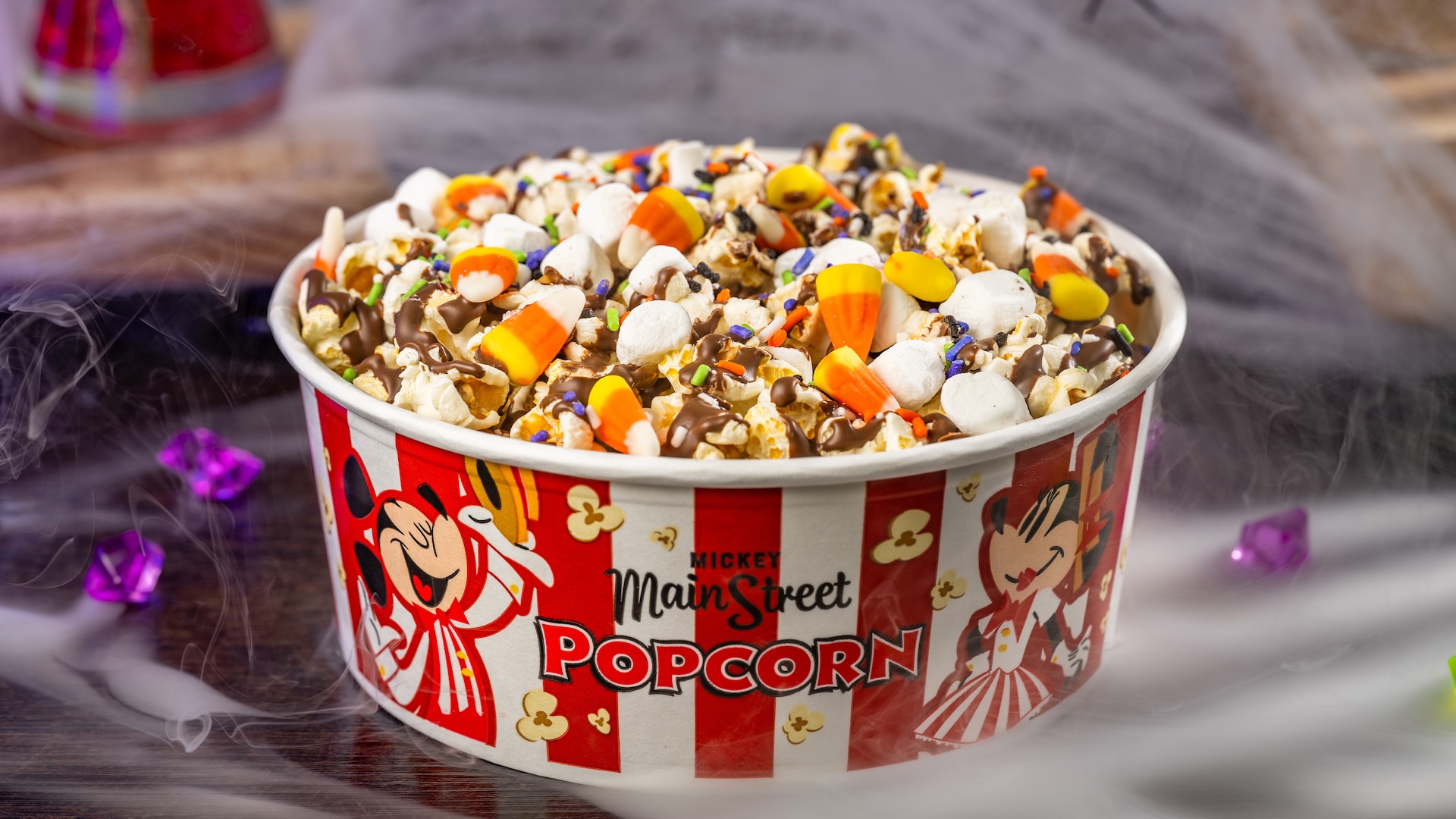 Halloween Popcorn Mix: Buttered popcorn with mini marshmallows, candy corn, Halloween sprinkles, and milk chocolatey drizzle (New) 