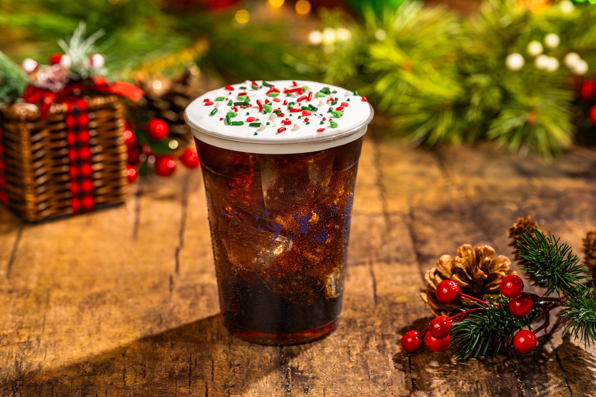Gingerbread Cola: Coca-Cola served with gingerbread syrup, cold foam, and festive sprinkles (Available during Mickey&rsquo;s Very Merry Christmas Party only) 