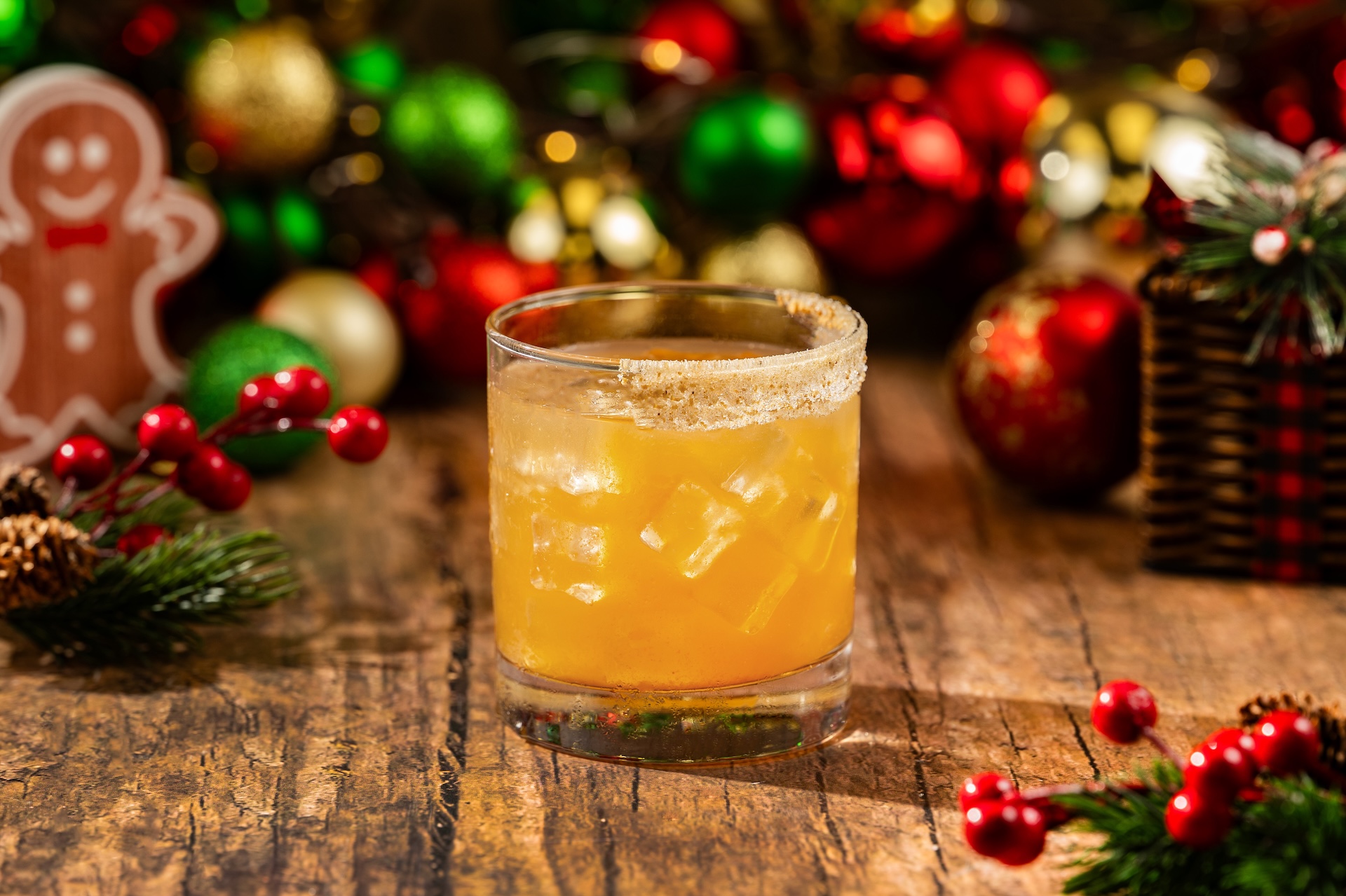 Jolly Holly Cocktail: Grainger's Deluxe Organic Vanilla Vodka, Myers's Original Dark Rum, speculoos syrup, and apple cider garnished with a sugared graham cracker rim (Available during Mickey&rsquo;s Very Merry Christmas Party only) 