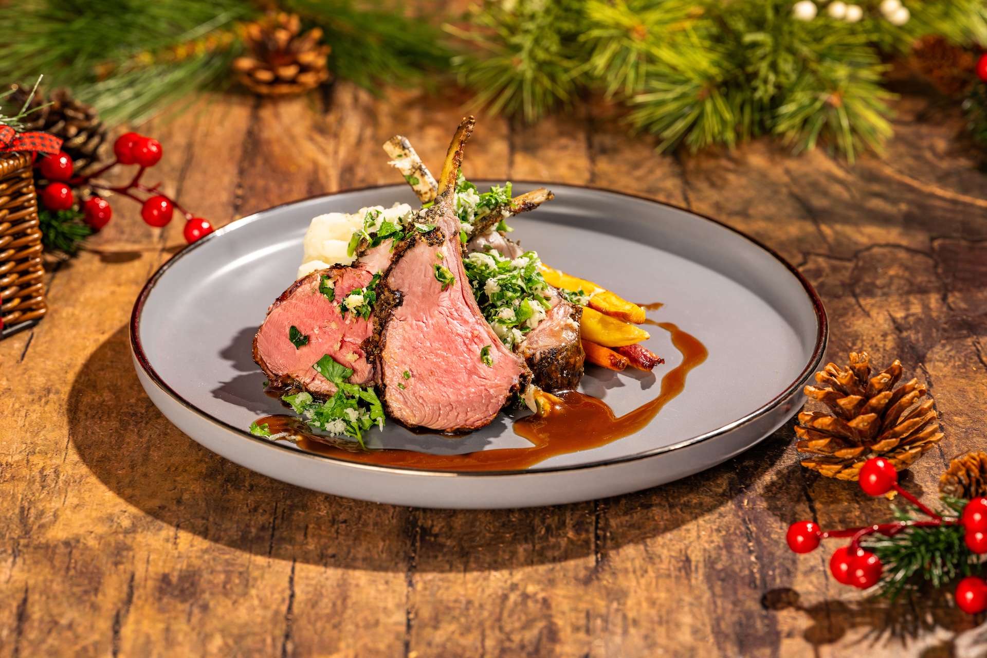 Roasted Lamb Chops with olive oil mashed potatoes, honey-glazed carrots, and cabernet-cherry jus (Available during Mickey&rsquo;s Very Merry Christmas Party only) 