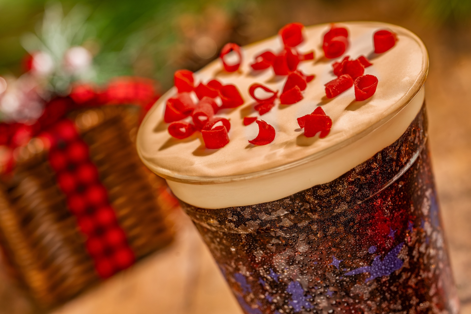 Peppermint Bark Cola Slushy: Frozen Coca-Cola, chocolate-peppermint swirl and sweet cream topped with chocolate curls (New) (Available during Mickey&rsquo;s Very Merry Christmas Party only) 
