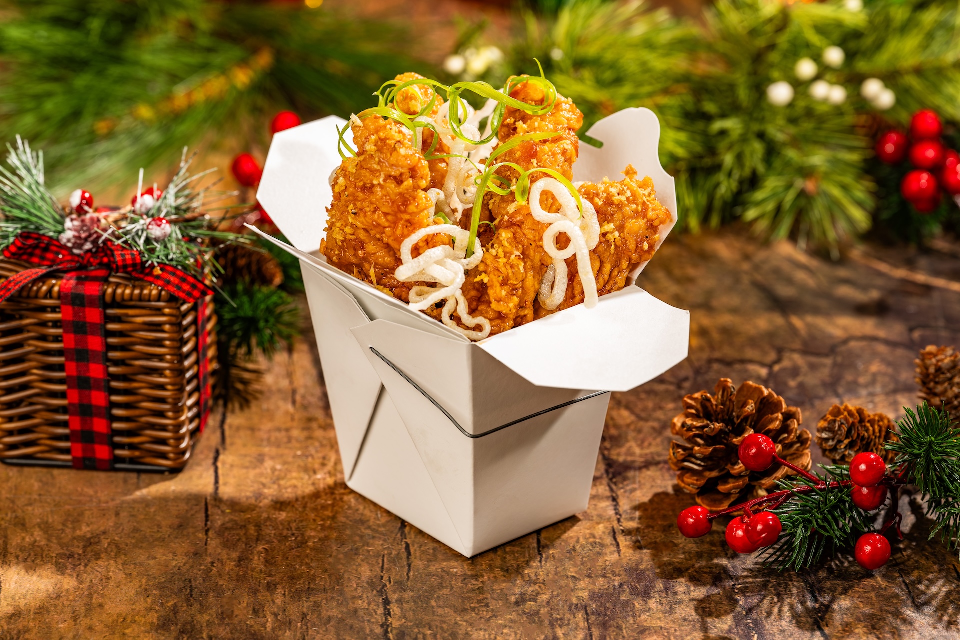 Orange Chicken Strips drizzled with orange-soy glaze, glass noodles, green onions, and crispy garlic (Available during Mickey&rsquo;s Very Merry Christmas Party only) 