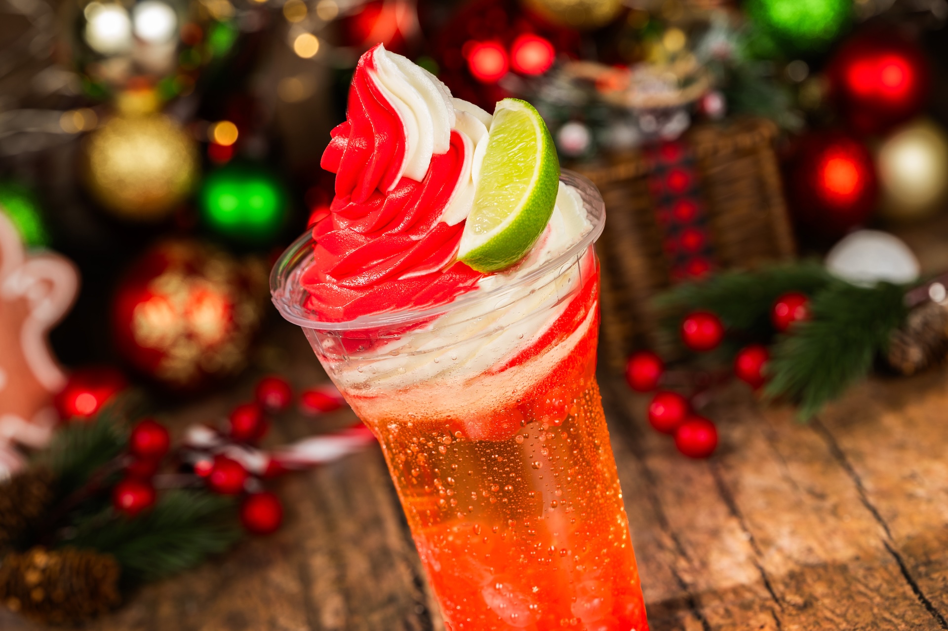 Pomegranate Yule Float: Seagram&rsquo;s Ginger Ale, DOLE Whip Pomegranate and vanilla soft-serve swirl, pomegranate flavor-filled pearls, and lime (Available during Mickey&rsquo;s Very Merry Christmas Party only) 