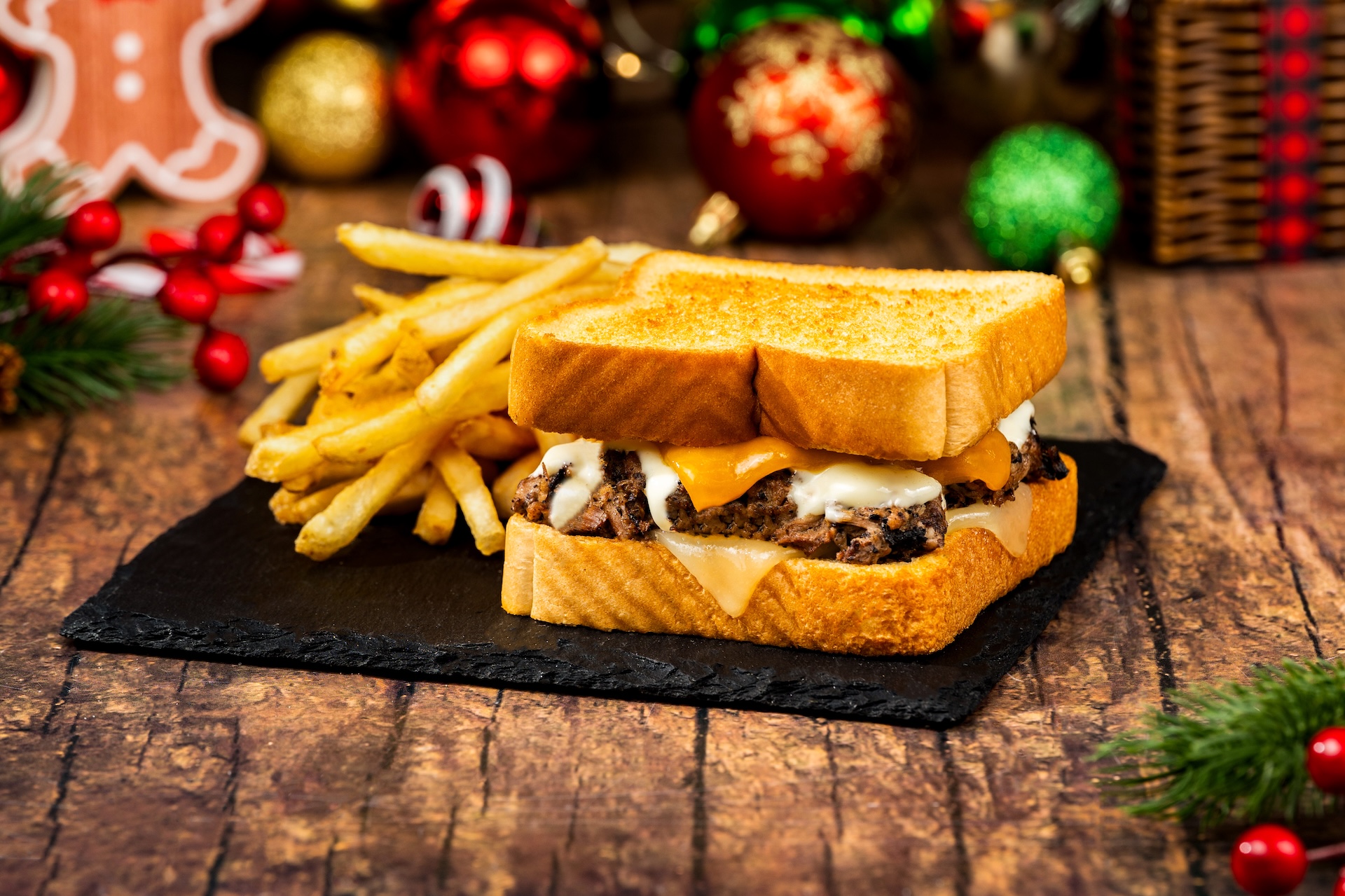 Holiday Pot Roast Melt: Slow-cooked beef on thick toast with cheddar, Swiss cheese, beef gravy, and horseradish cream sauce (Available during Mickey&rsquo;s Very Merry Christmas Party only) 