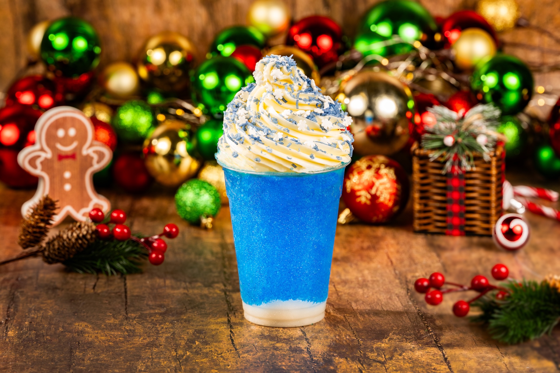 Brr-Raspberry Slushy: Blue raspberry slushy with coconut cream, whipped cream, and sweet blue coconut (Available during Mickey&rsquo;s Very Merry Christmas Party only) 