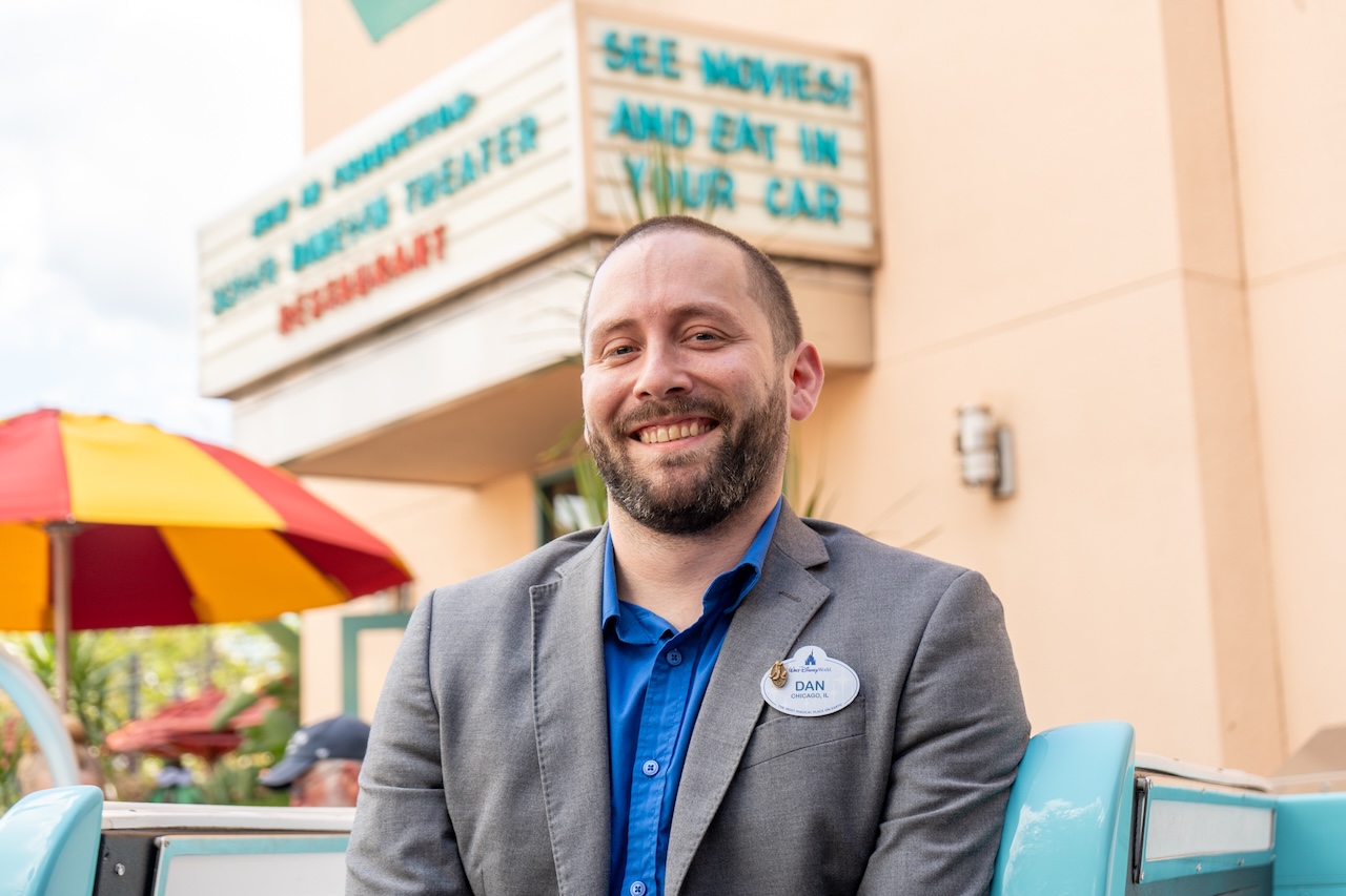 Dan smiling in front of restaurant.